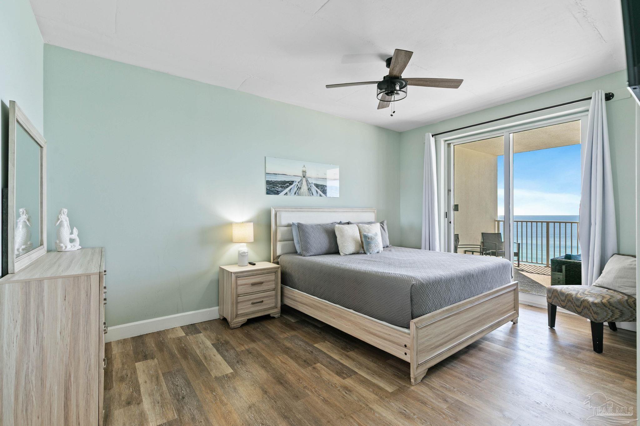 10611 Front Beach Road, Unit 1303 Panama City Beach, FL 32408 - Photo 28 of 71 a bedroom with a bed and window