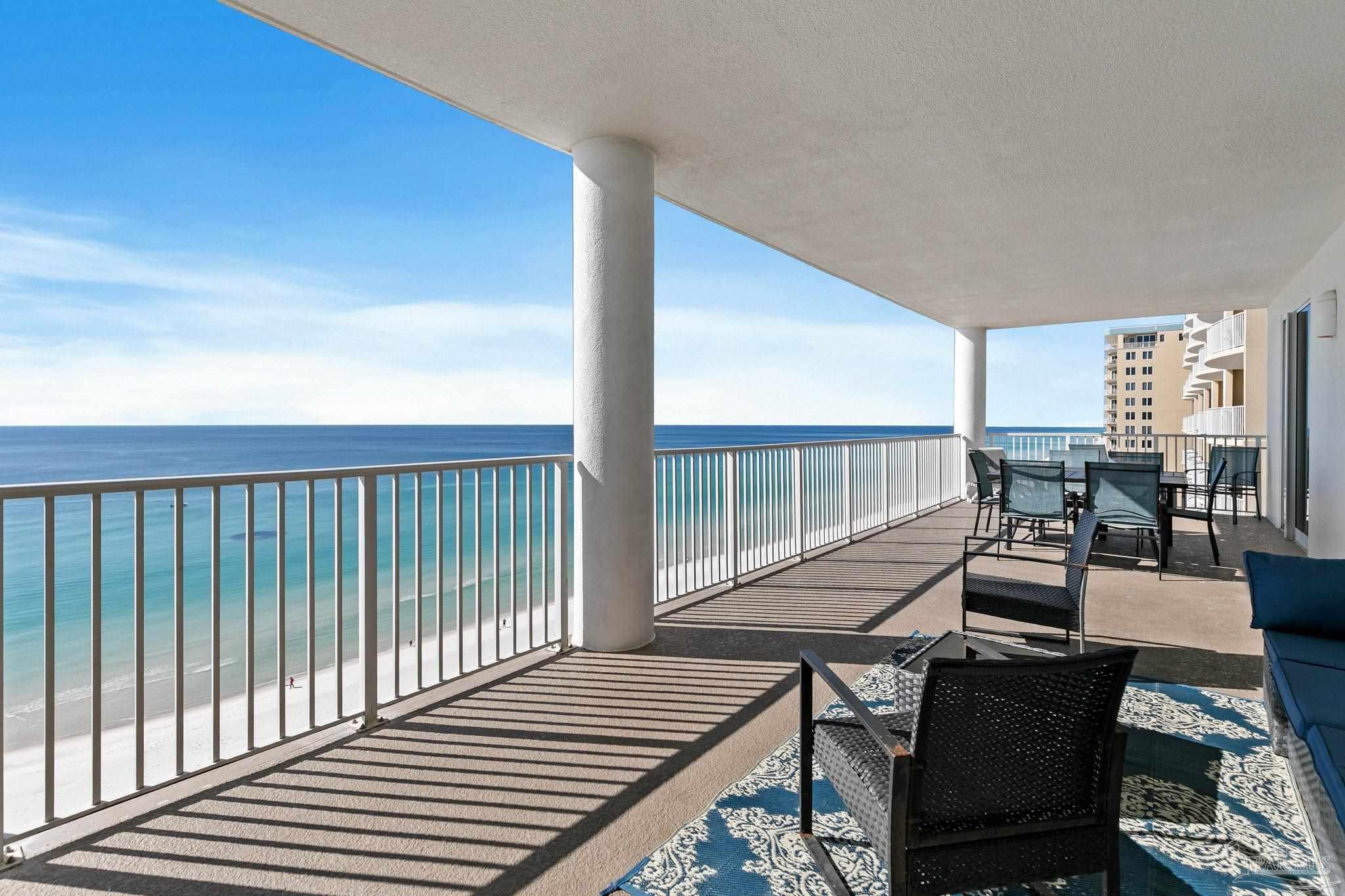 10611 Front Beach Road, Unit 1303 Panama City Beach, FL 32408 - Photo 51 of 71 a view of balcony with wooden floor and seating space