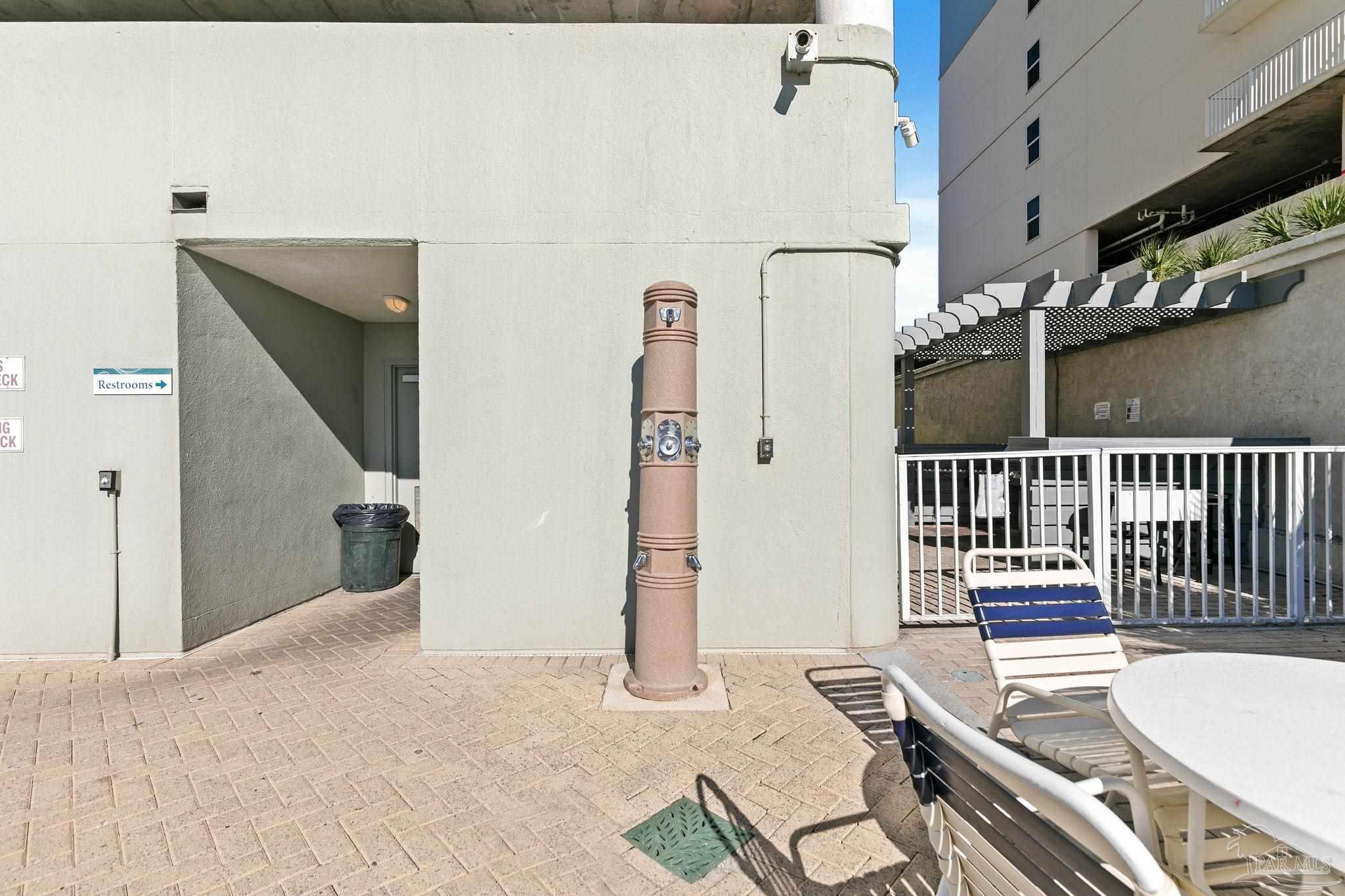 10611 Front Beach Road, Unit 1303 Panama City Beach, FL 32408 - Photo 60 of 71 a view of a hallway with dining room and furniture