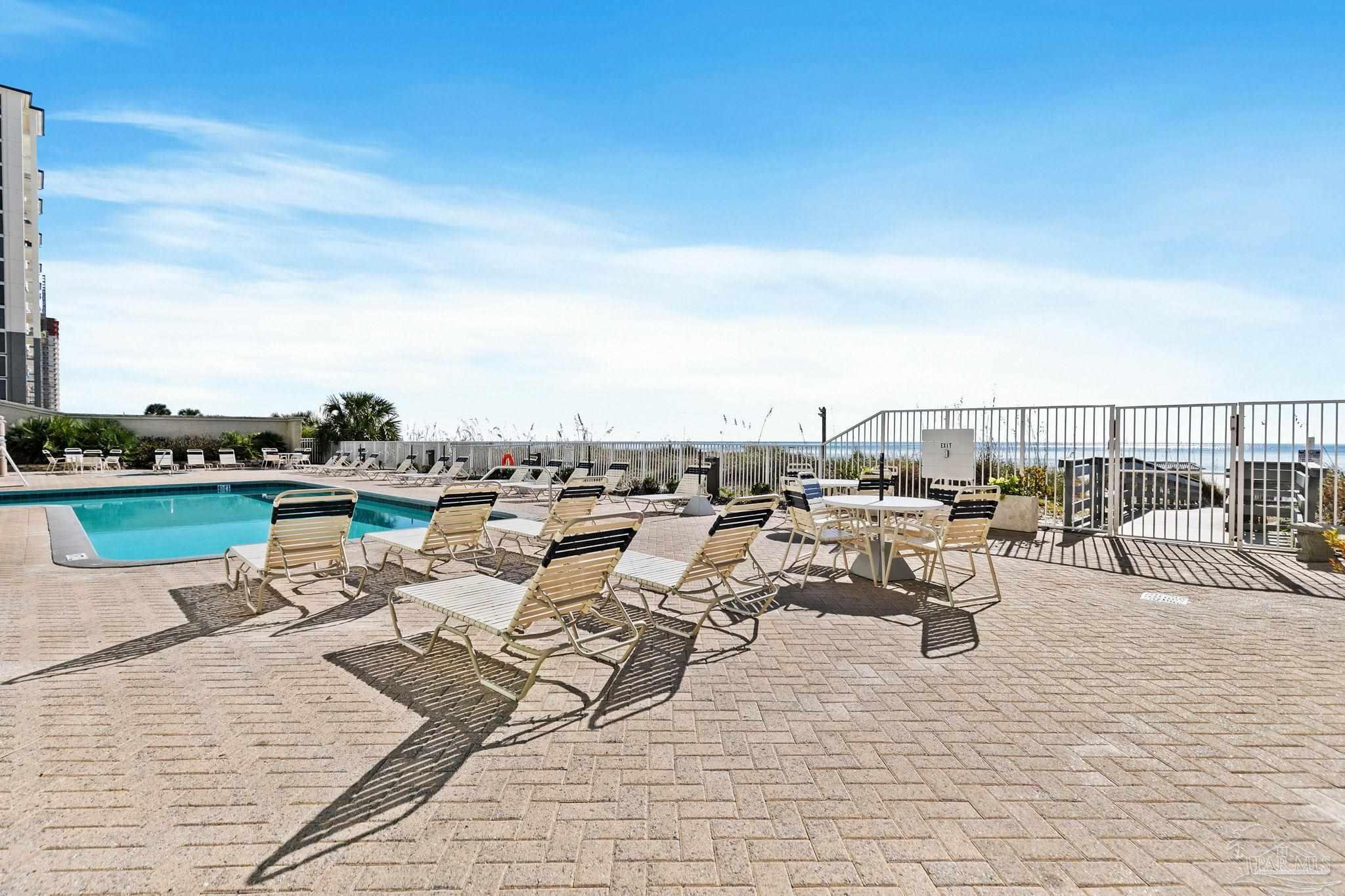 10611 Front Beach Road, Unit 1303 Panama City Beach, FL 32408 - Photo 63 of 71 a view of a terrace with seating space