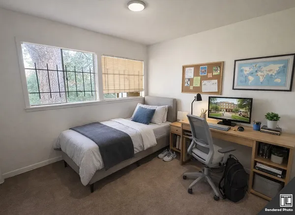 a bedroom with a bed and a window