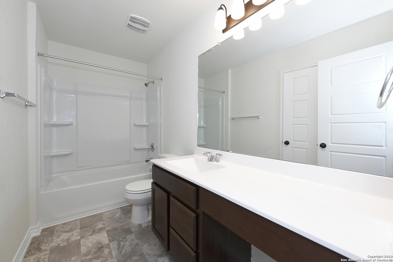 6511 Runaway Row Converse, TX 78109 - Photo 28 of 42 a bathroom with a sink a toilet and shower