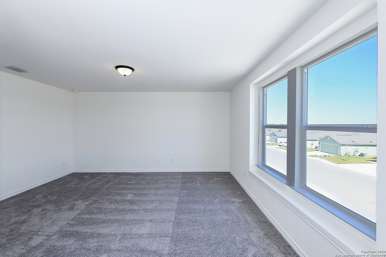 6511 Runaway Row Converse, TX 78109 - Photo 31 of 42 wooden floor in an empty room with a window