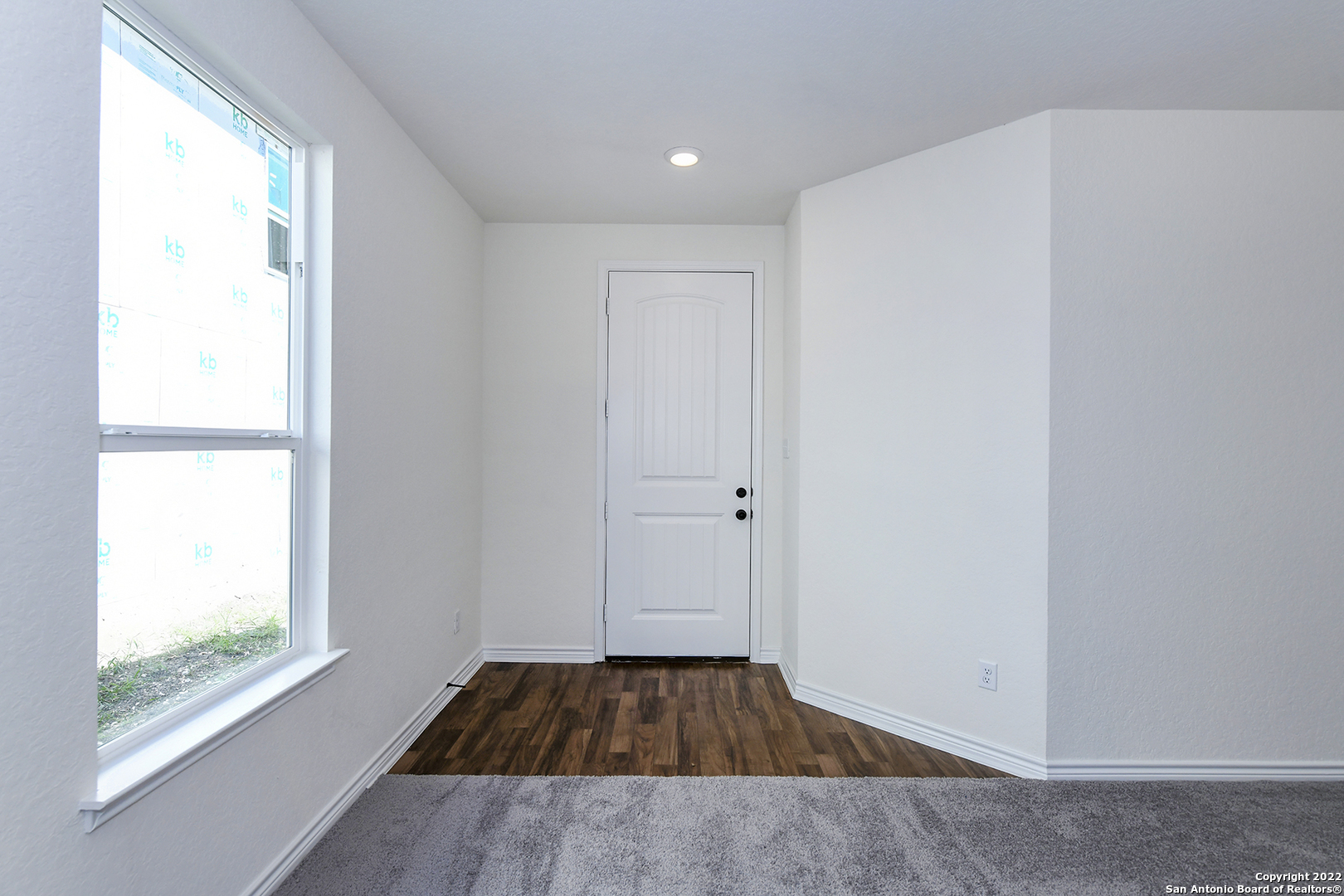 6511 Runaway Row Converse, TX 78109 - Photo 5 of 42 a view of a room with wooden floor and window