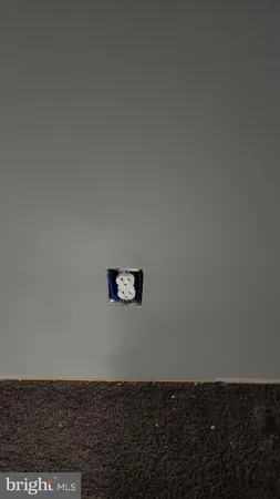 a view of small space with racks on the wall