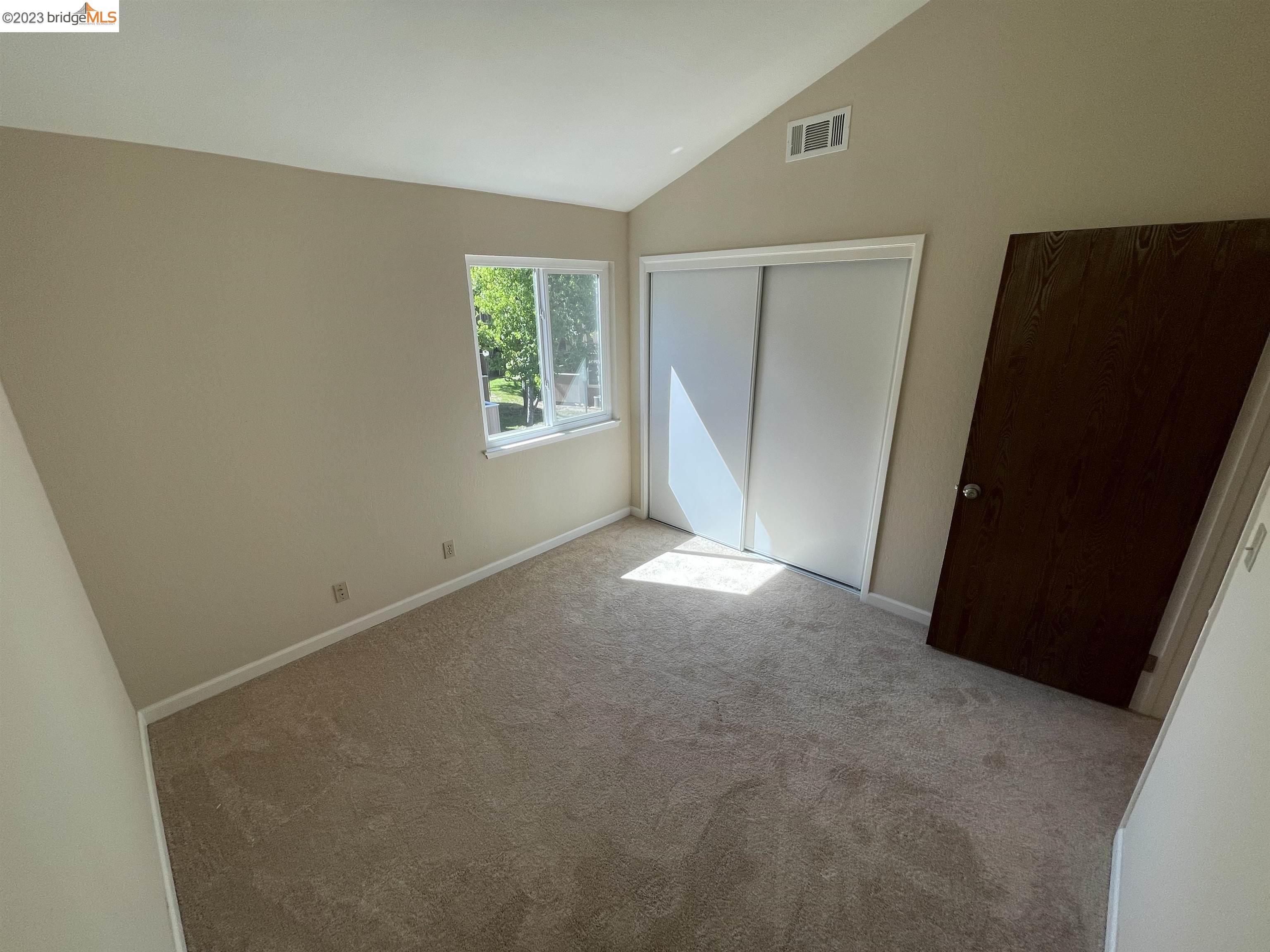 3901 Clayton Road, Unit 57 Concord, CA 94521 - Photo 19 of 40 an empty room with windows