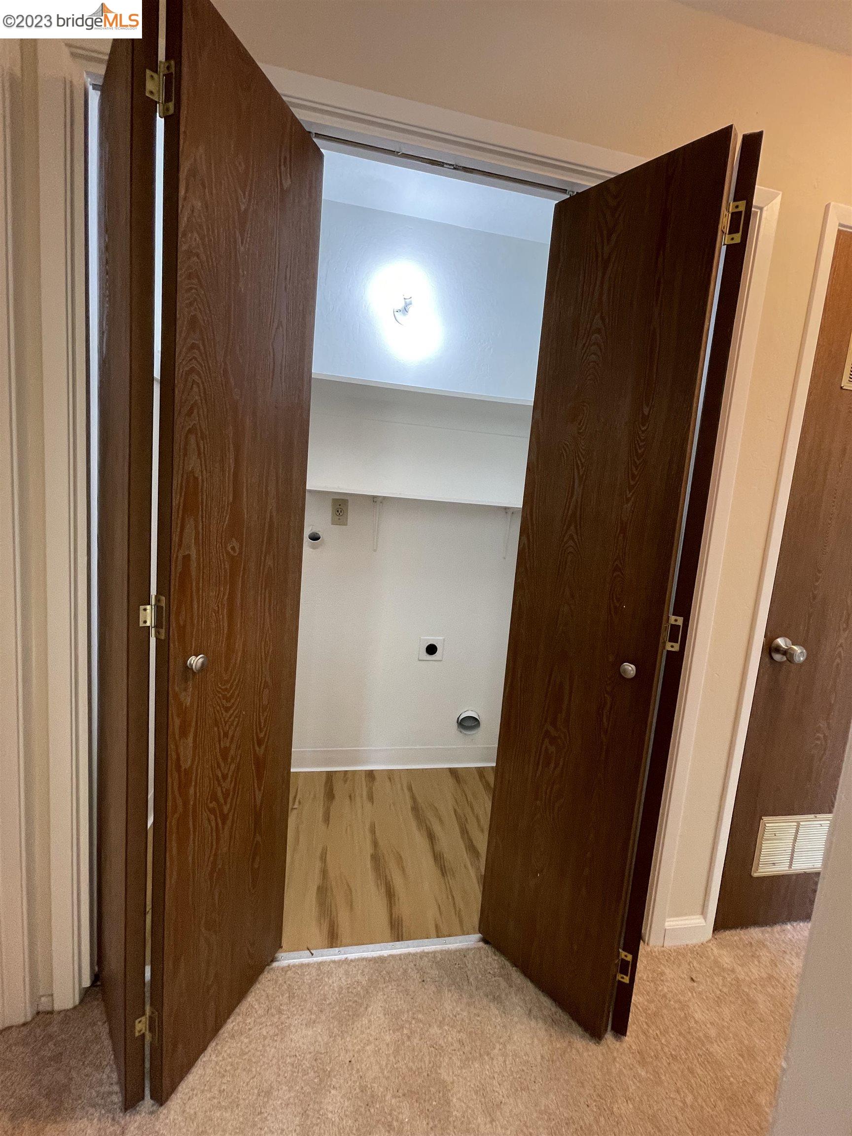 3901 Clayton Road, Unit 57 Concord, CA 94521 - Photo 23 of 40 a view of entryway with a wooden door