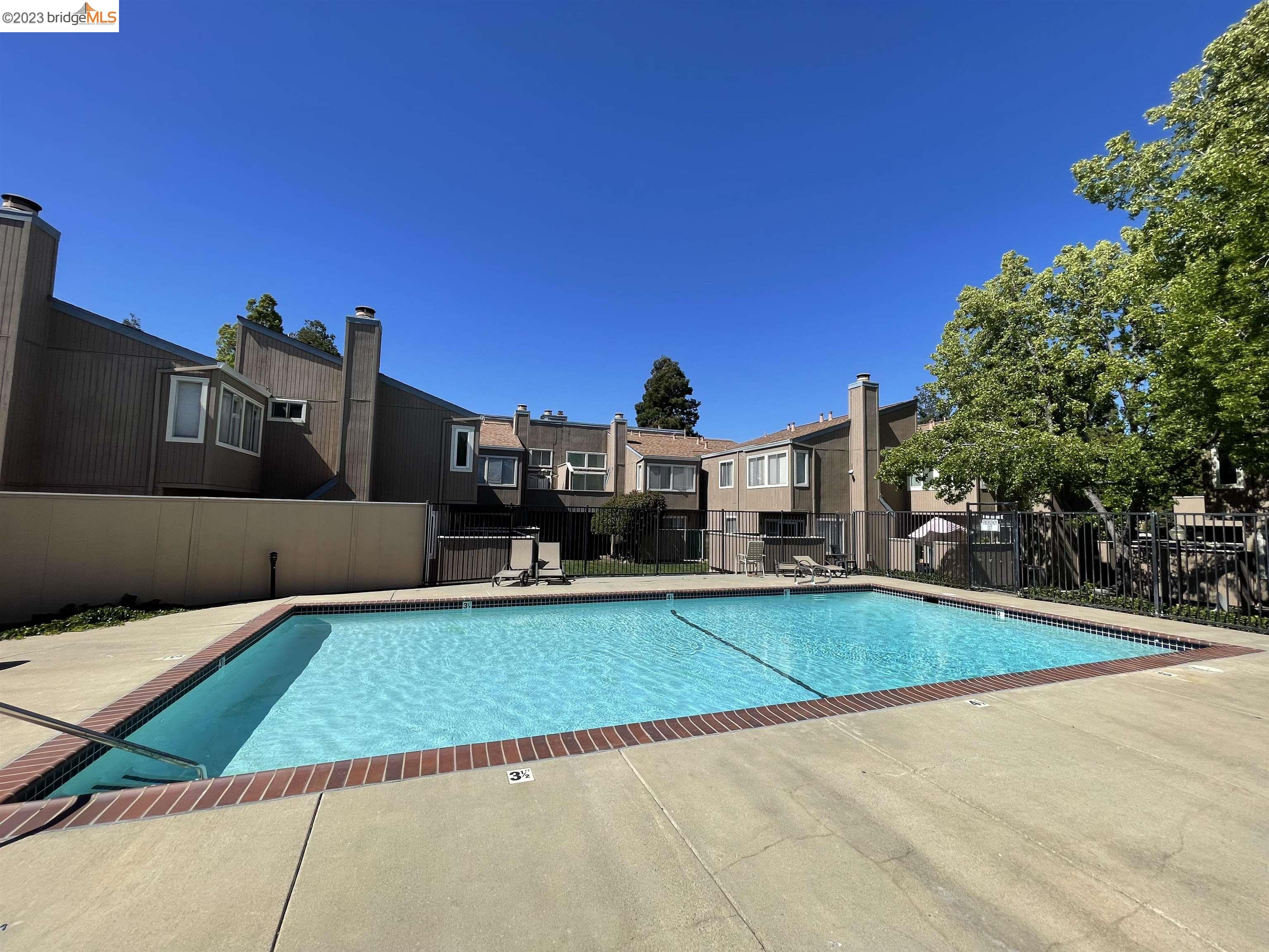 3901 Clayton Road, Unit 57 Concord, CA 94521 - Photo 38 of 40 a view of a house with swimming pool