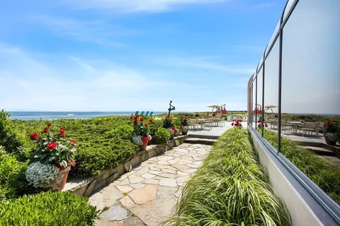 a view of swimming pool from a balcony