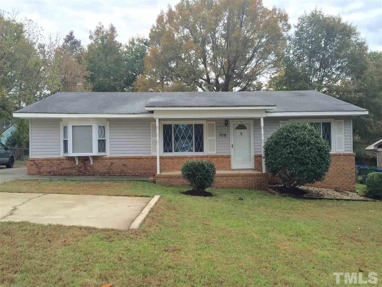 706 Chandler Road Durham, NC 27703 - Photo 2 of 24 front view of a house with a patio