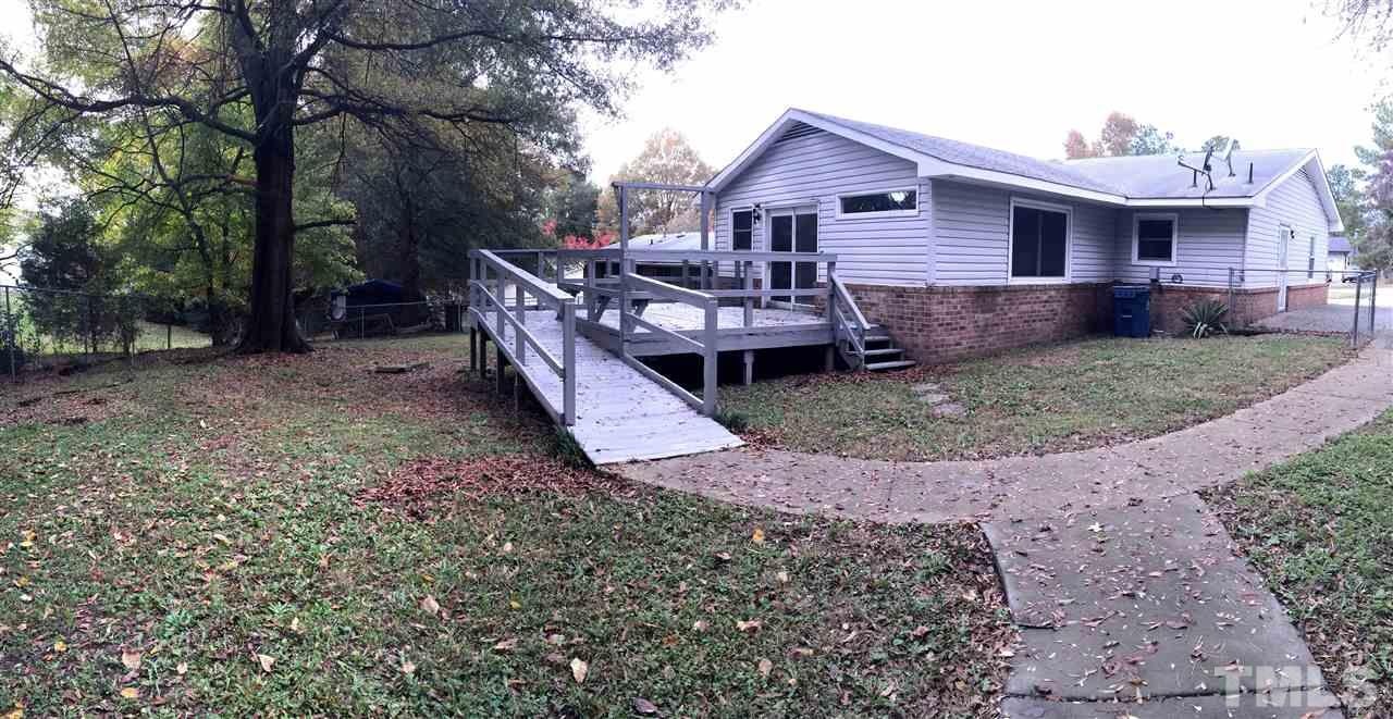 706 Chandler Road Durham, NC 27703 - Photo 24 of 24 a view of a house with a yard