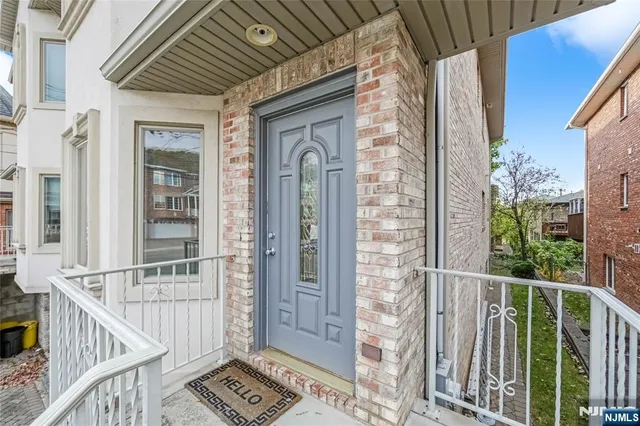 a view of a balcony with door