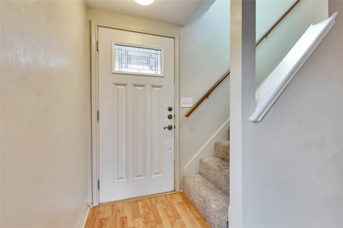 8806 Springmail Circle, Unit B Austin, TX 78729 - Photo 8 of 16 a view of entryway with stairs