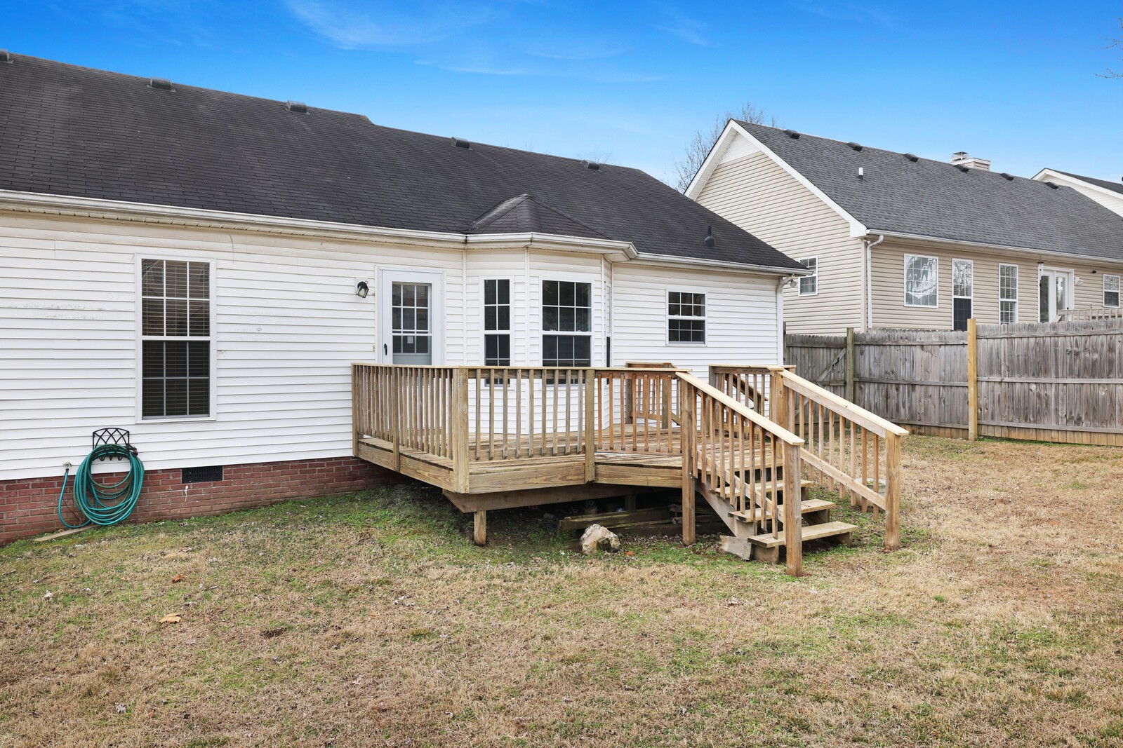244 Green Hills Drive Springfield, TN 37172 - Photo 17 of 18 a view of a house with a yard and deck