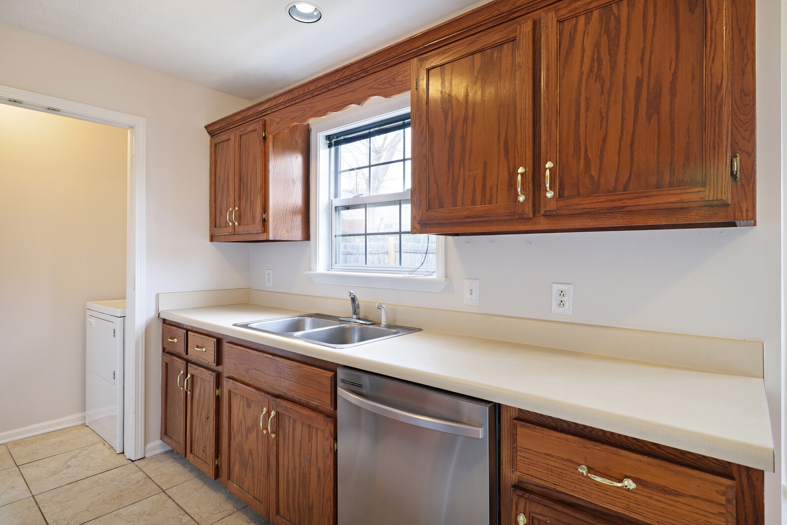 244 Green Hills Drive Springfield, TN 37172 - Photo 7 of 18 a kitchen with a sink cabinets and a window