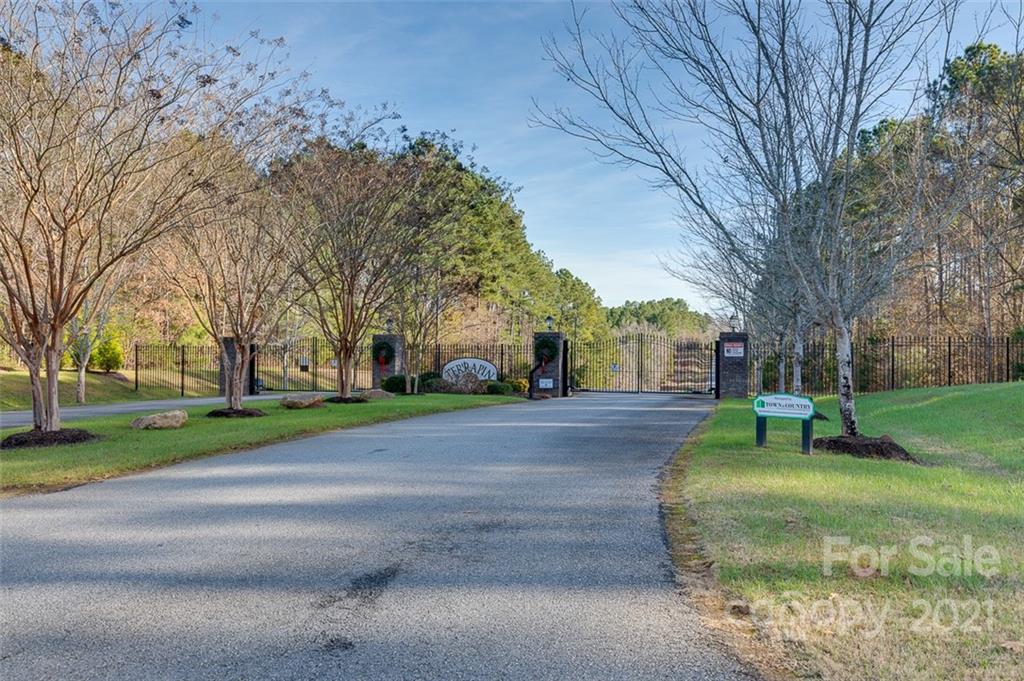 331 Terrapin Pointe Road, Unit 19 Hodges, SC 29653 - Photo 5 of 13 a view of a park with large trees