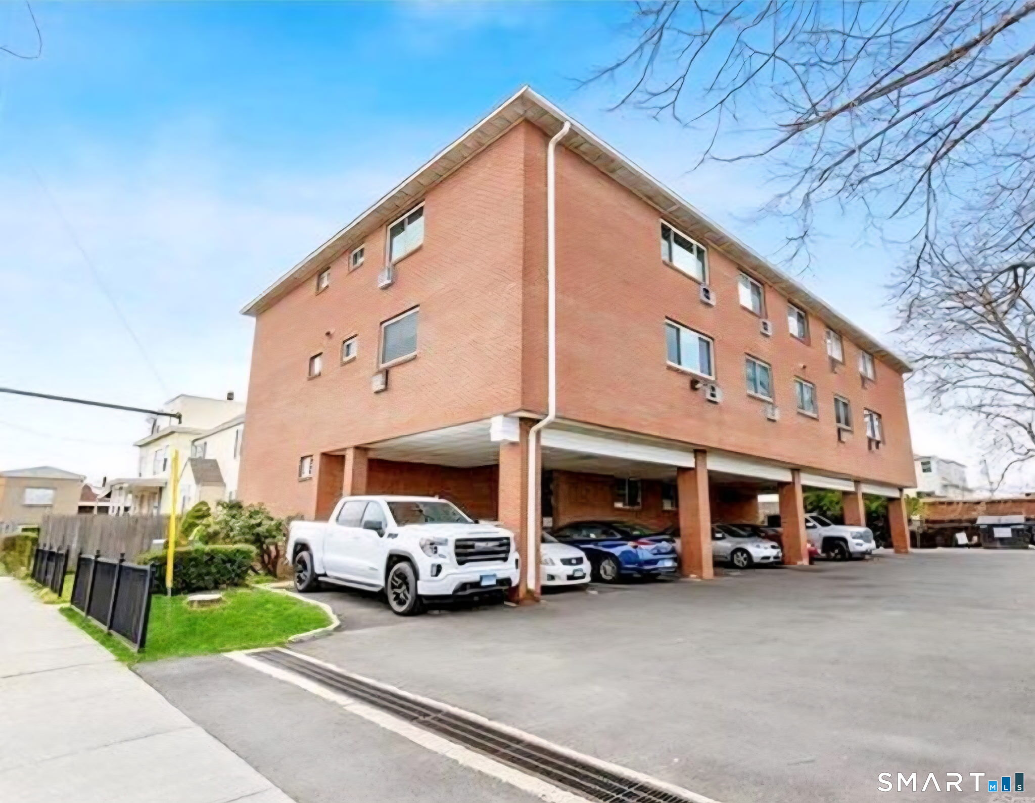 a view of a cars parked in front of a building