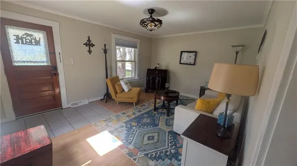 a living room with furniture and a window