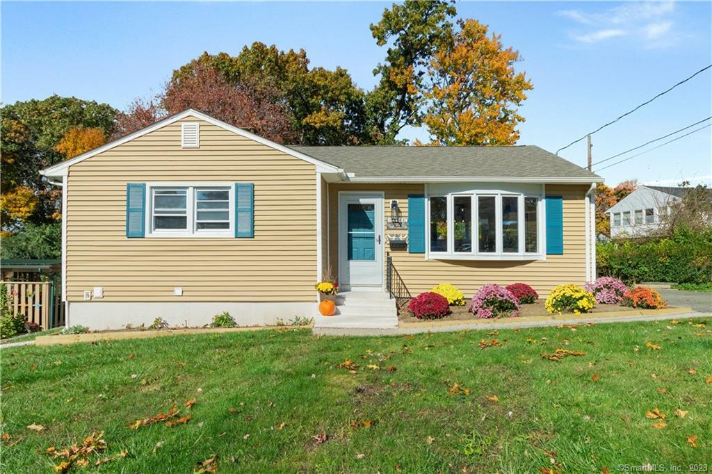 16 Tree Hill Road Waterbury, CT 06708 - Photo 1 of 1 a front view of house with yard