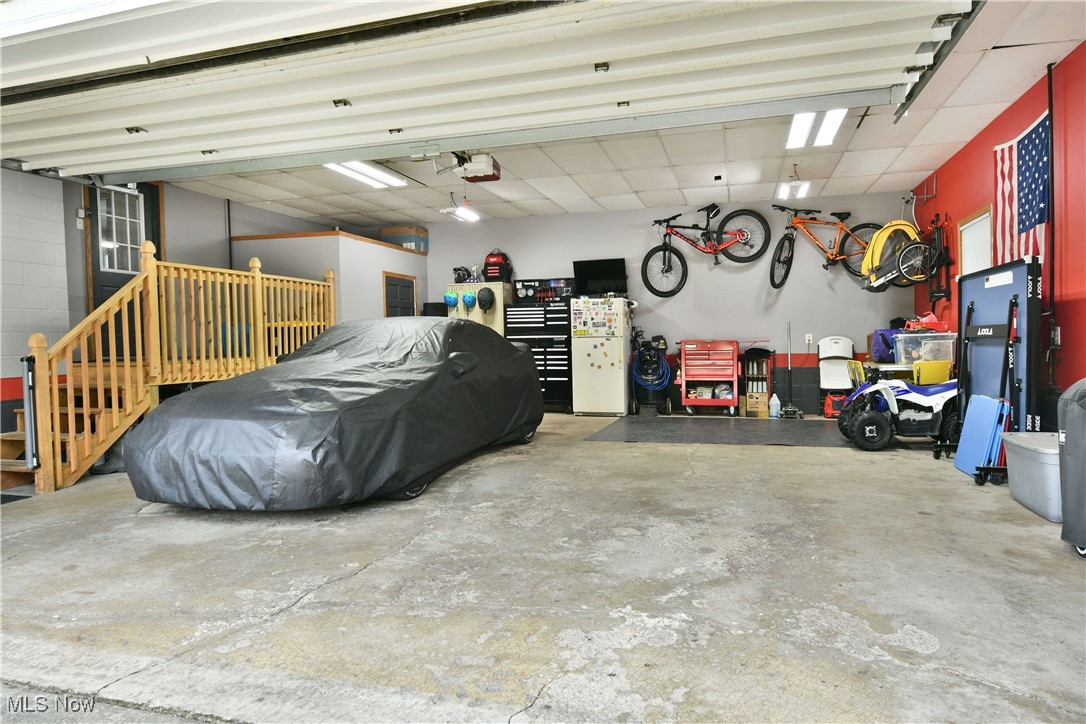 2847 Selkirk Bush Road Warren, OH 44481 - Photo 44 of 47 Garage with a garage door opener