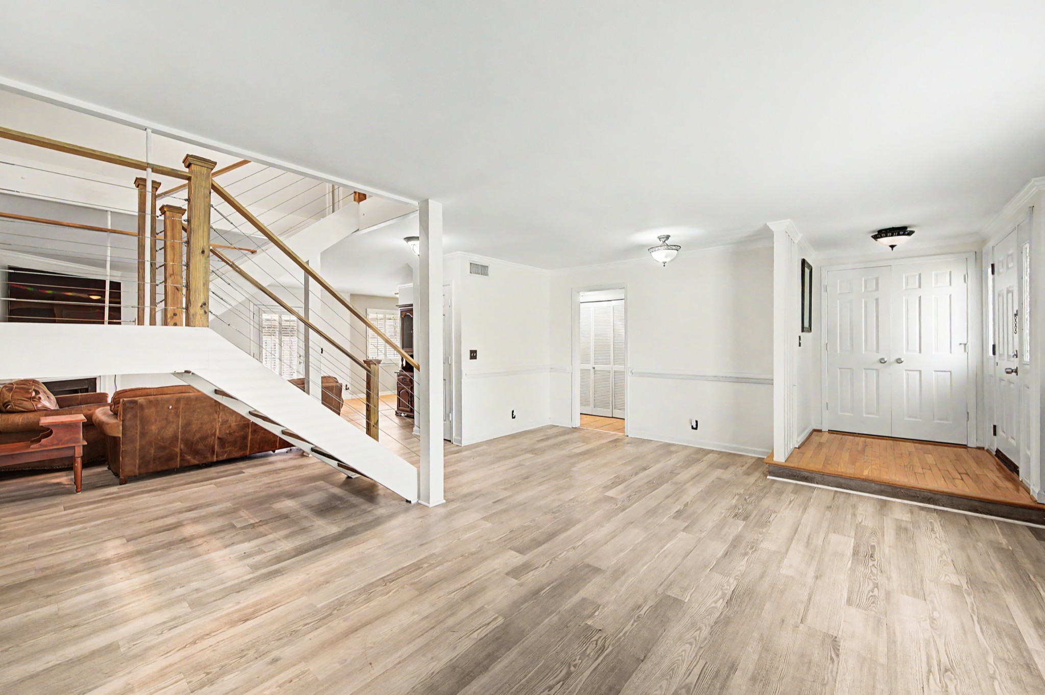 8300 Sawyer Brown Road, Unit A304 Nashville, TN 37221 - Photo 12 of 57 a view of an empty room and wooden floor