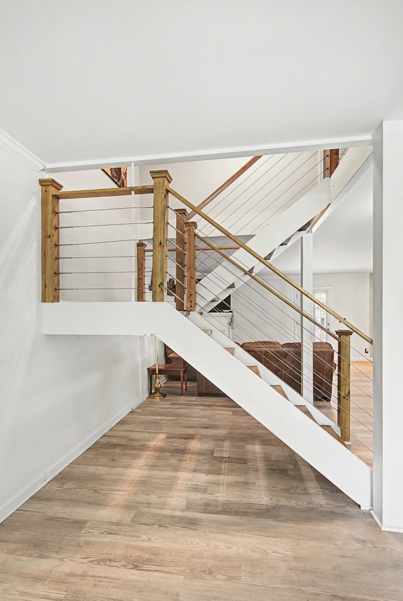 8300 Sawyer Brown Road, Unit A304 Nashville, TN 37221 - Photo 14 of 57 a view of entryway and hall with wooden floor