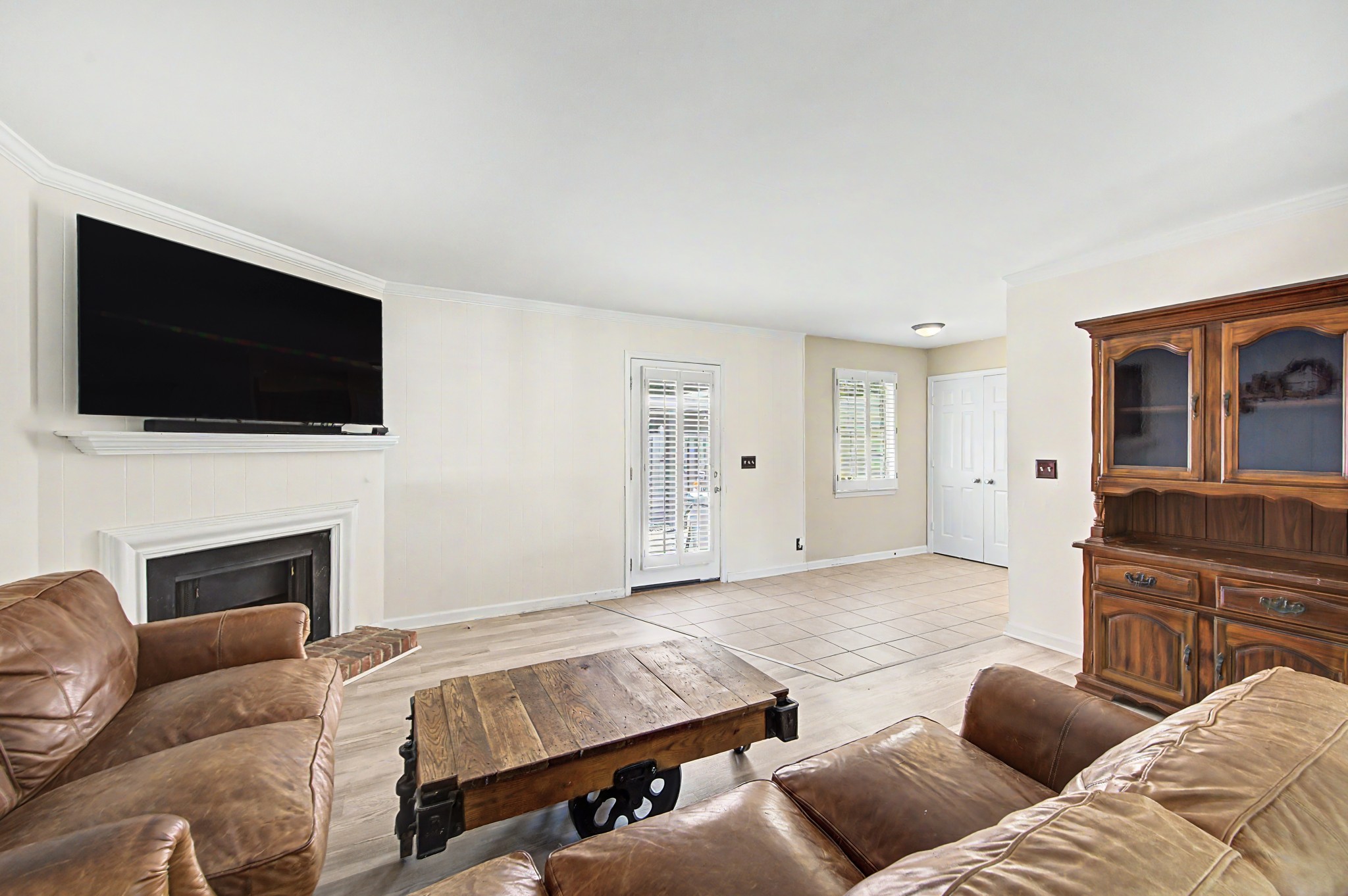 8300 Sawyer Brown Road, Unit A304 Nashville, TN 37221 - Photo 17 of 57 a living room with furniture and a flat screen tv