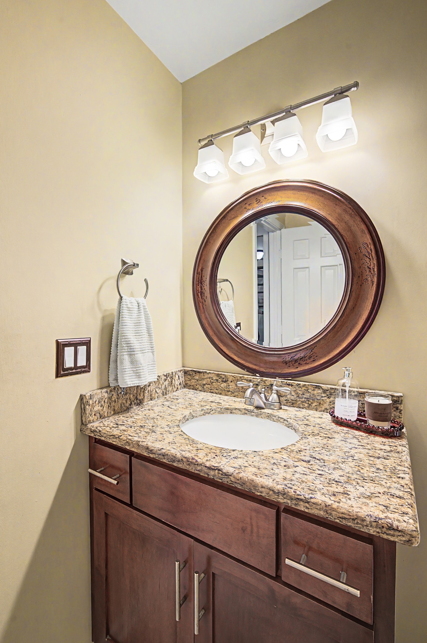 8300 Sawyer Brown Road, Unit A304 Nashville, TN 37221 - Photo 28 of 57 a bathroom with a granite countertop sink and a mirror
