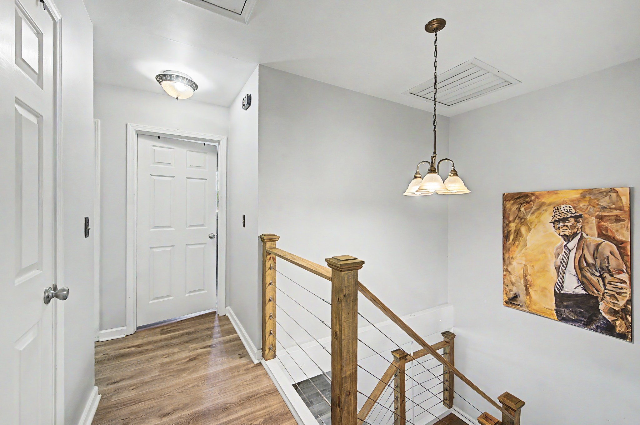 8300 Sawyer Brown Road, Unit A304 Nashville, TN 37221 - Photo 29 of 57 a view of a hallway with a chandelier