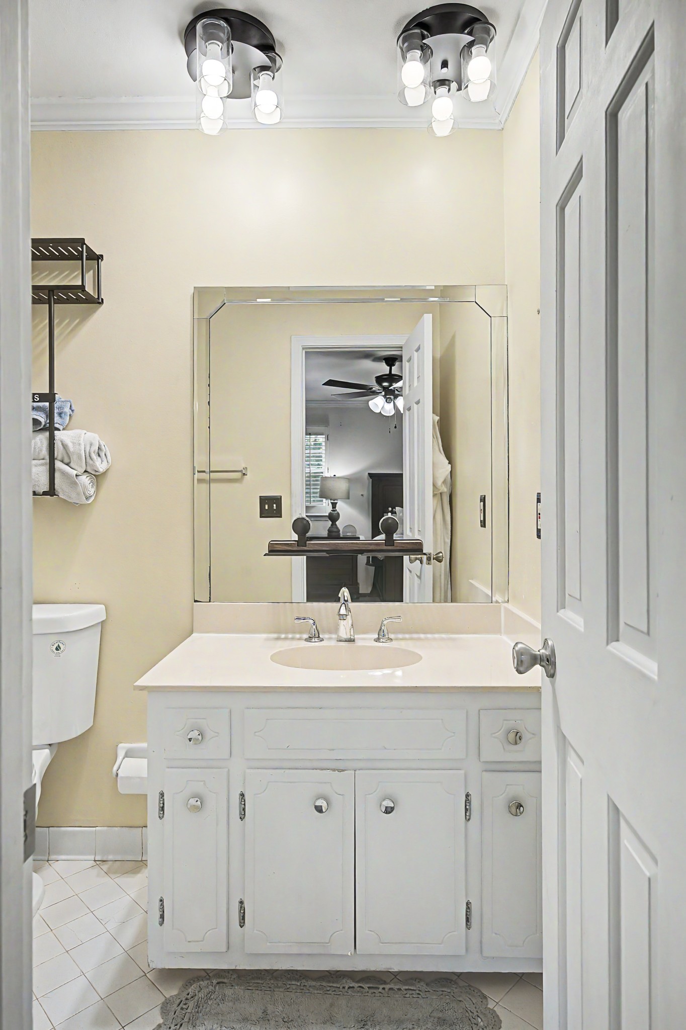 8300 Sawyer Brown Road, Unit A304 Nashville, TN 37221 - Photo 32 of 57 a bathroom with a sink vanity granite and a mirror