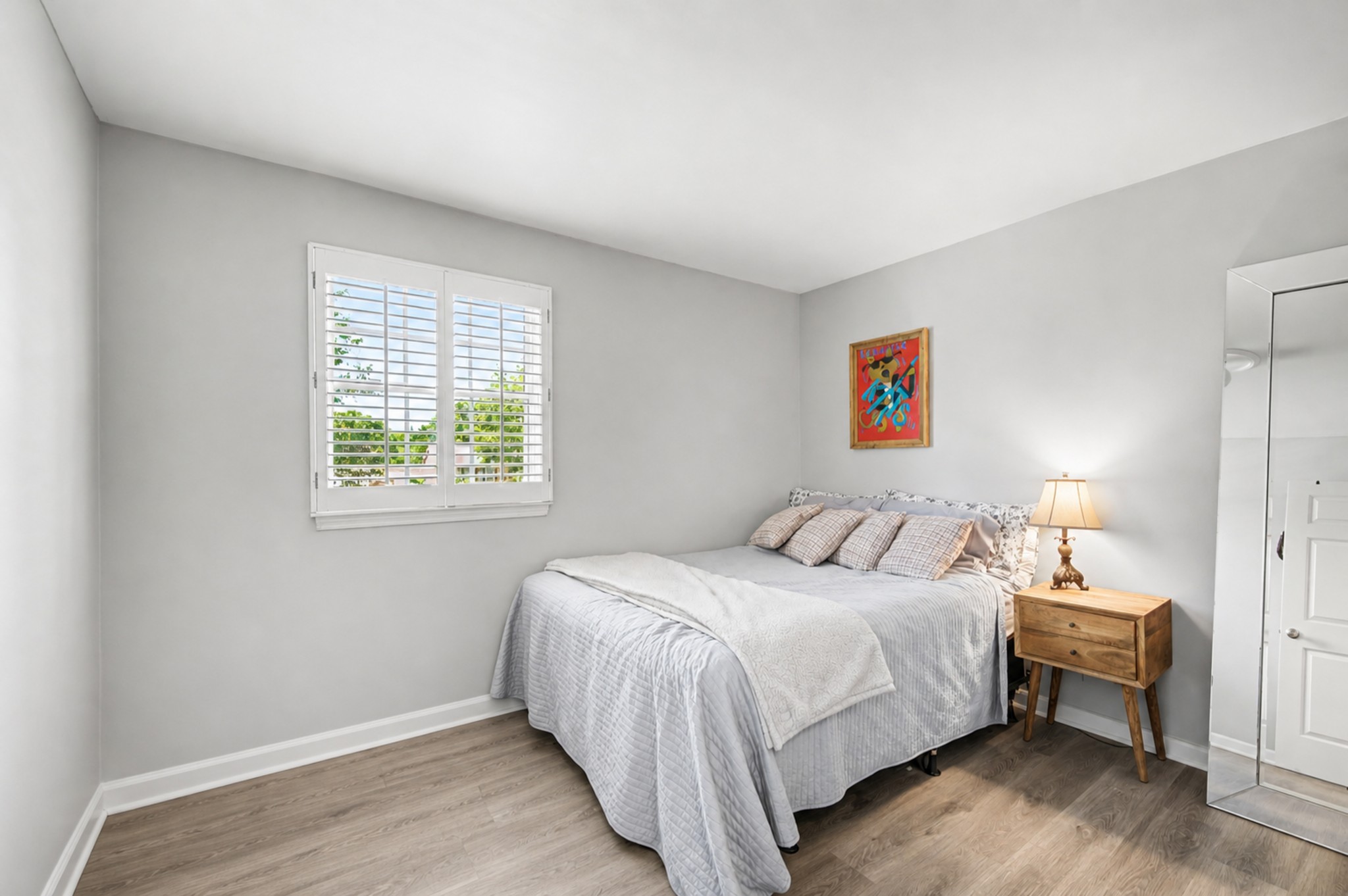 8300 Sawyer Brown Road, Unit A304 Nashville, TN 37221 - Photo 34 of 57 a bedroom with a bed and a window