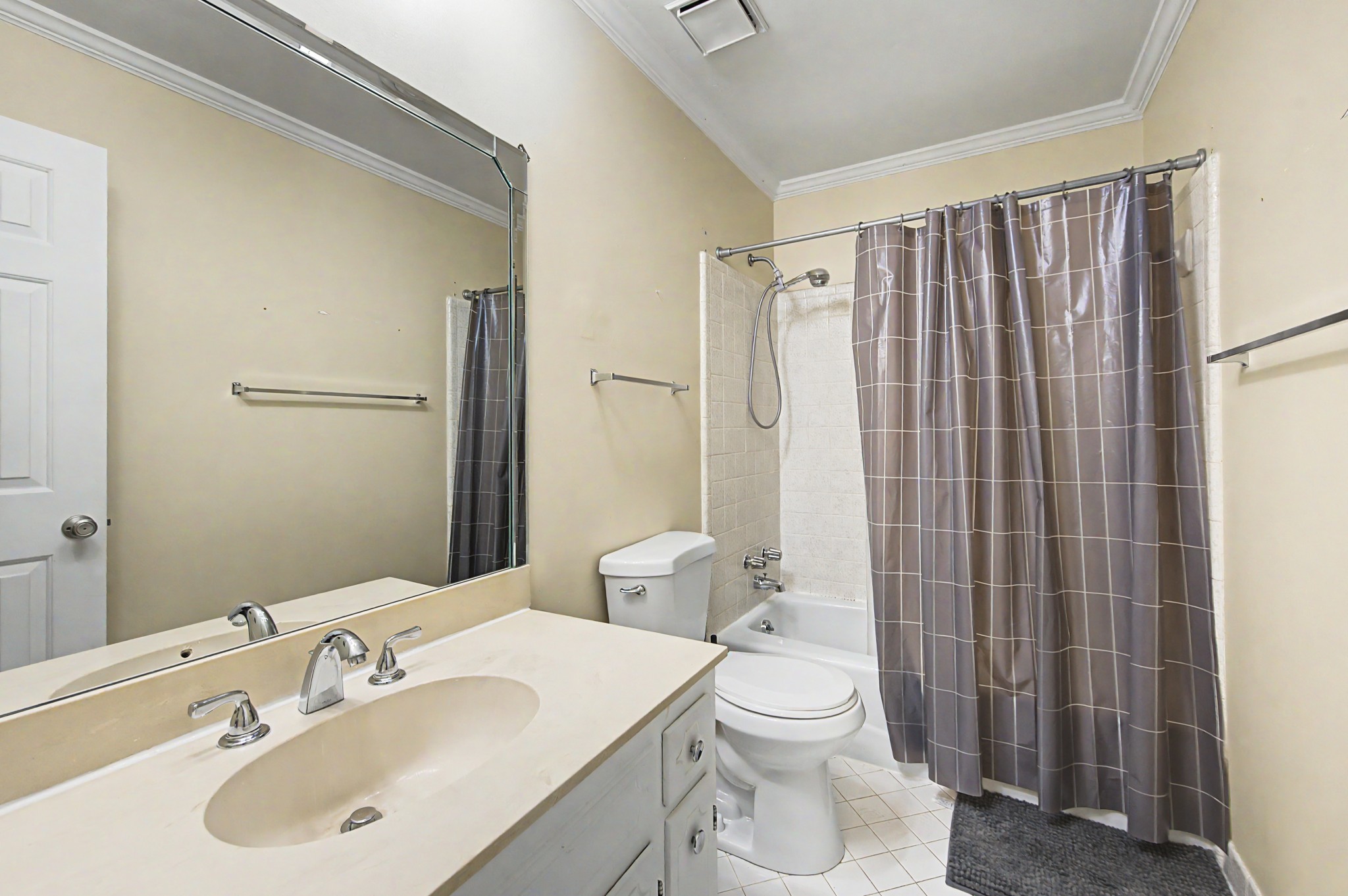 8300 Sawyer Brown Road, Unit A304 Nashville, TN 37221 - Photo 35 of 57 a bathroom with a sink a toilet and shower curtain