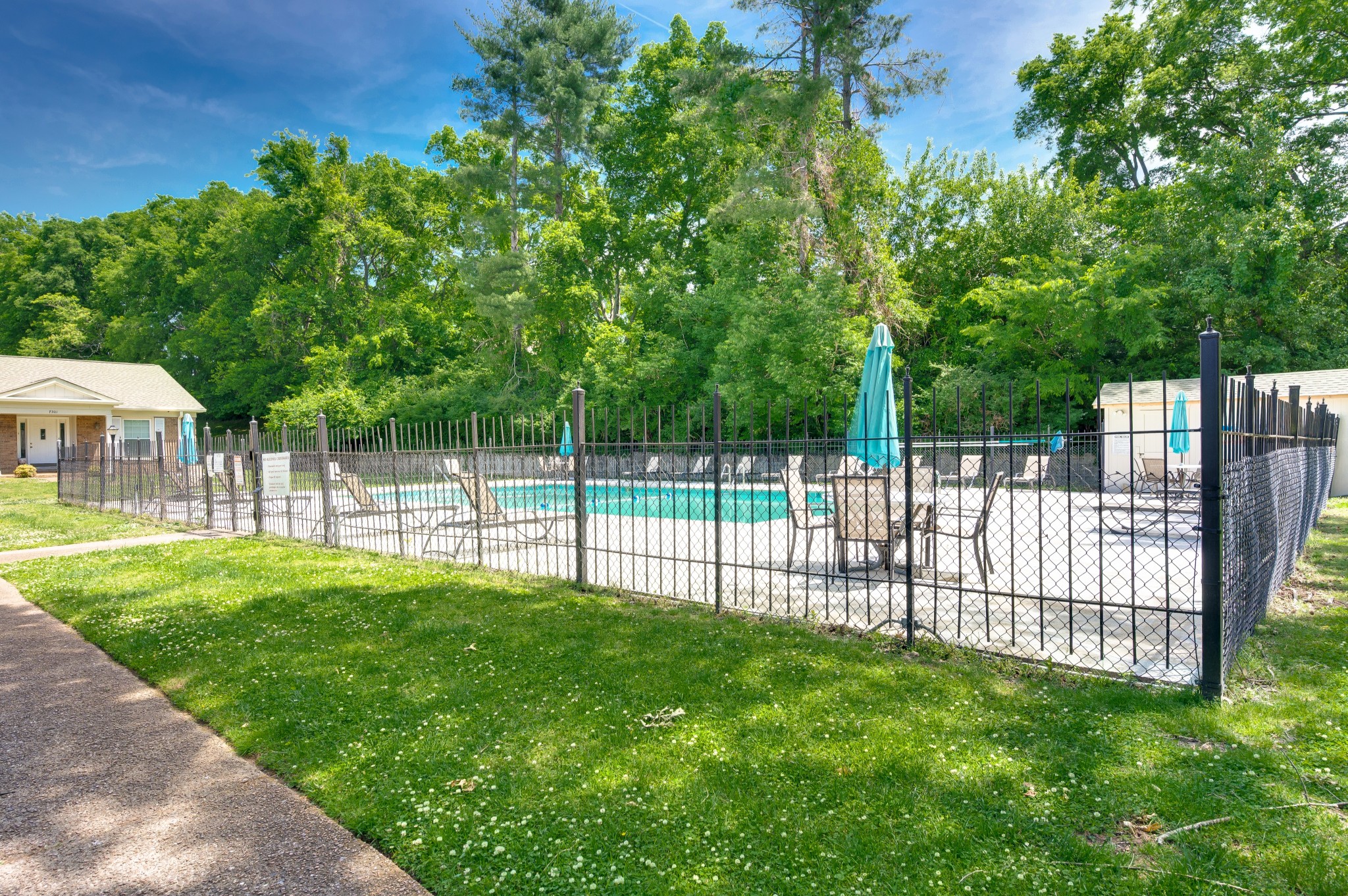 8300 Sawyer Brown Road, Unit A304 Nashville, TN 37221 - Photo 43 of 57 a view of a yard with wooden fence and a bench