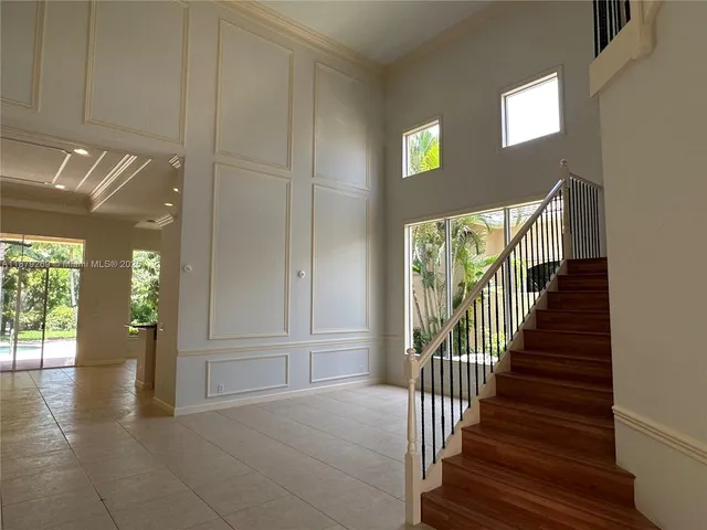 a view of entryway with stairs
