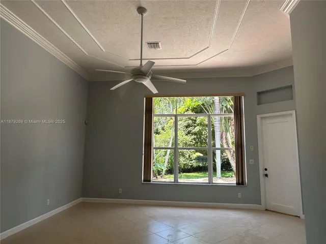 a view of a room with a large window