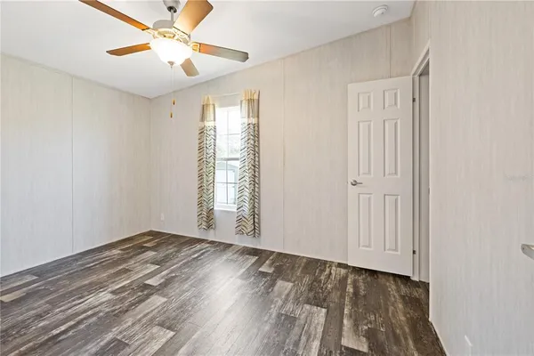 a view of bedroom with wooden floor bedroom and bedroom
