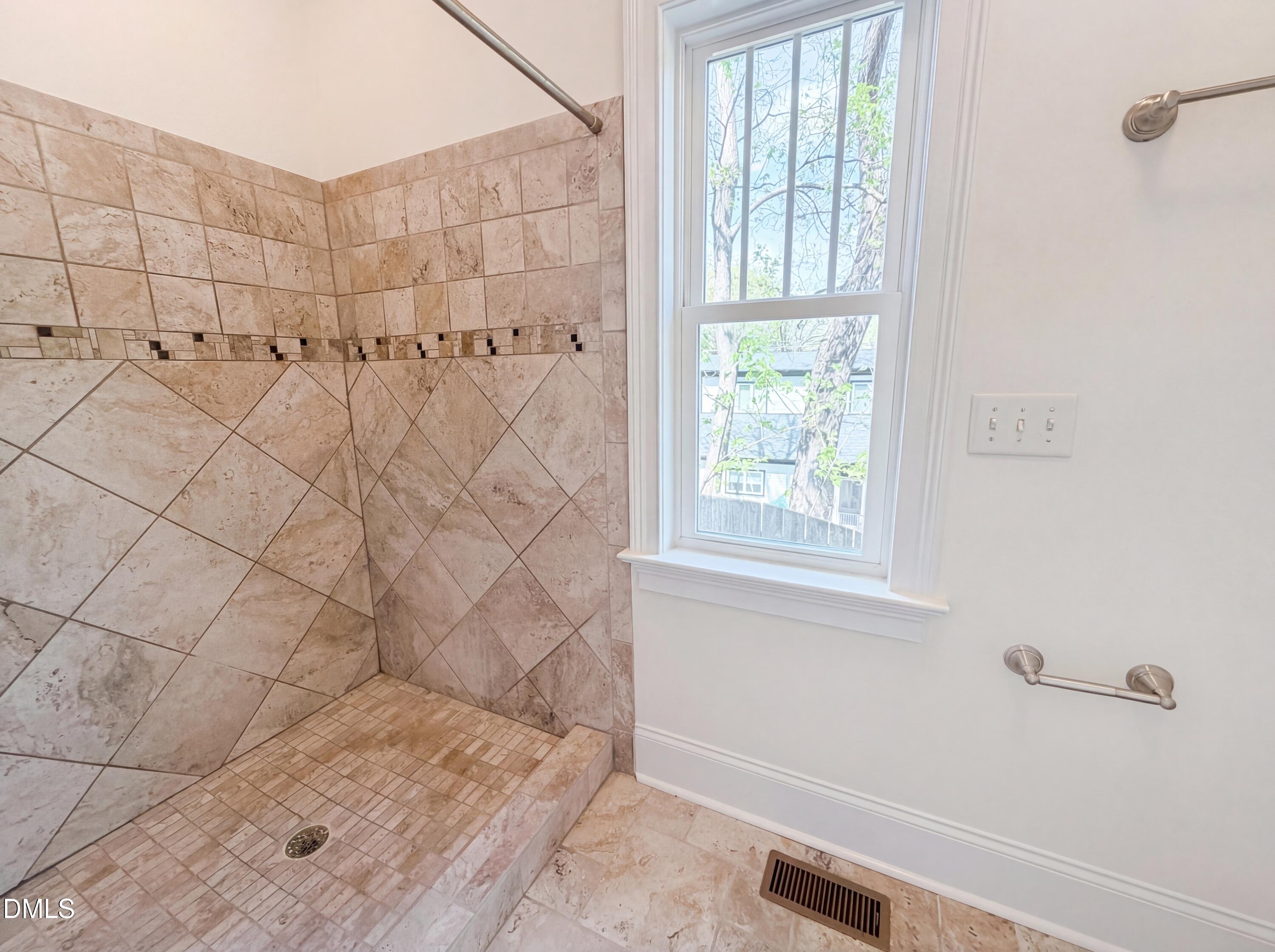 1007 Hazel Street Durham, NC 27701 - Photo 15 of 17 a bathroom with a shower
