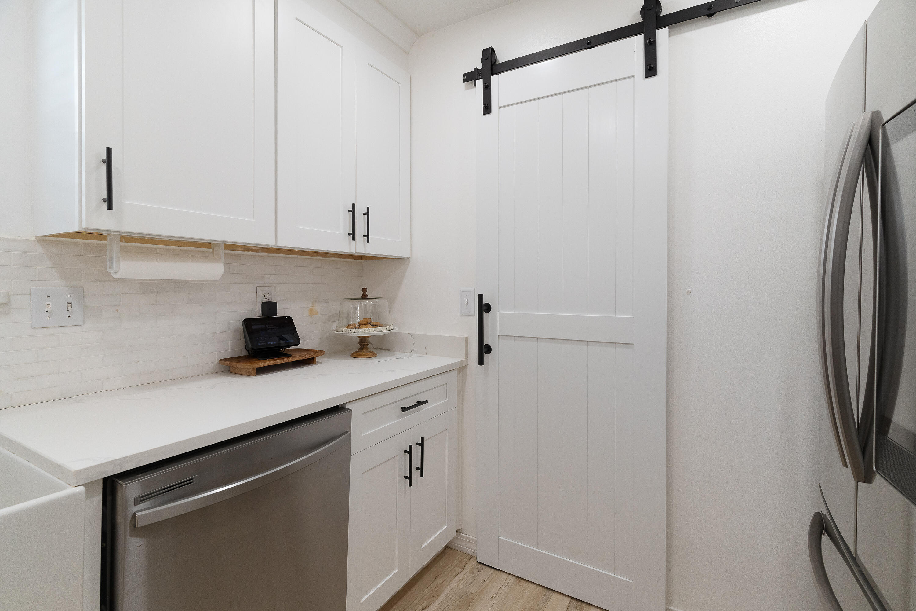 125 Wright Circle Niceville, FL 32578 - Photo 12 of 51 a kitchen with a sink and a refrigerator