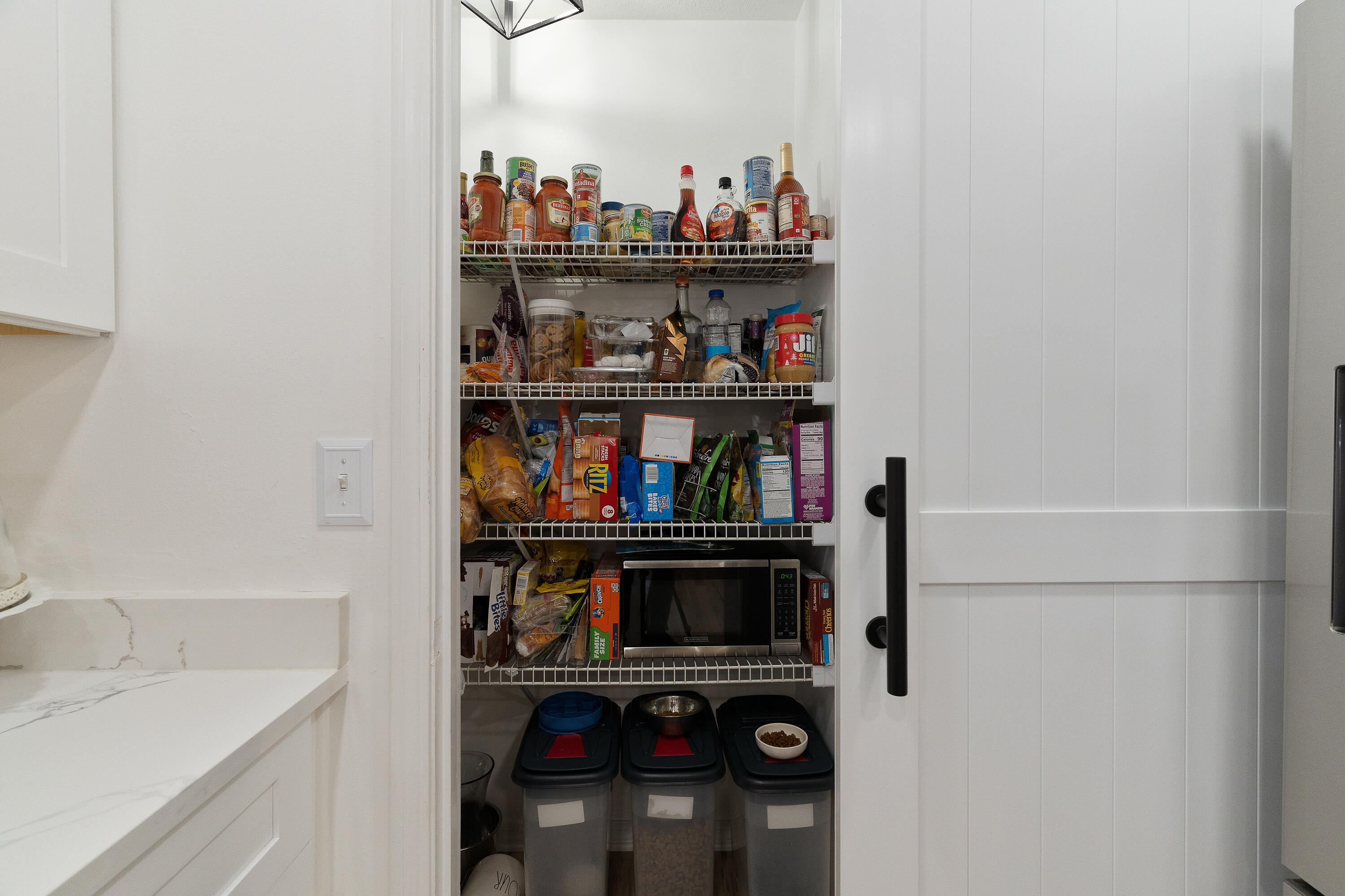 125 Wright Circle Niceville, FL 32578 - Photo 14 of 51 a shelf with books and knick knacks on it