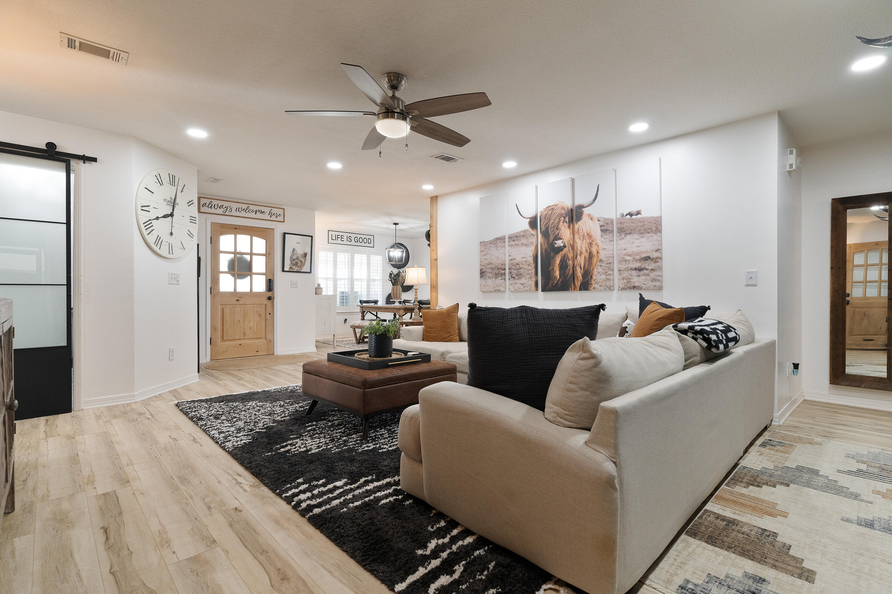 125 Wright Circle Niceville, FL 32578 - Photo 18 of 51 a living room with furniture and a chandelier
