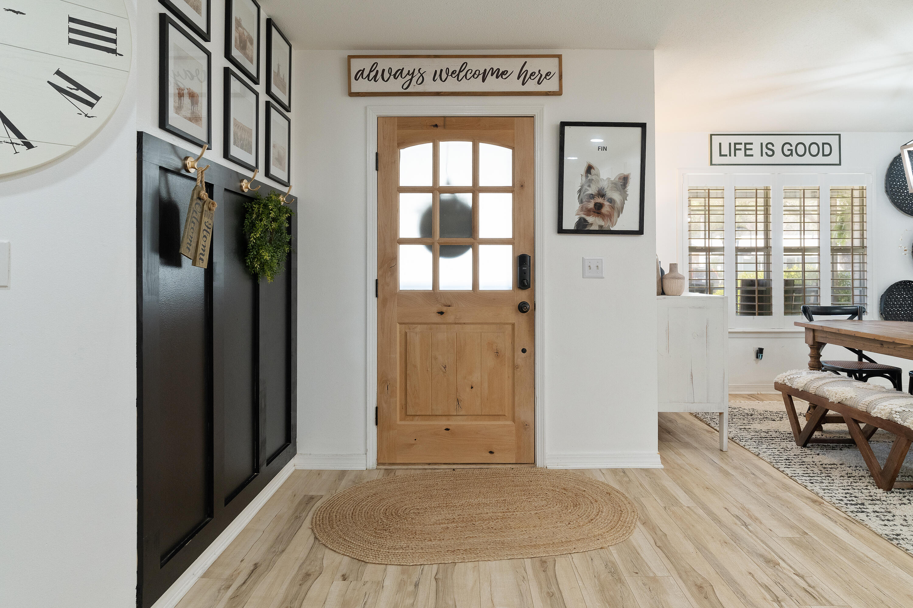 125 Wright Circle Niceville, FL 32578 - Photo 2 of 51 a view of a bedroom with wooden floor and windows