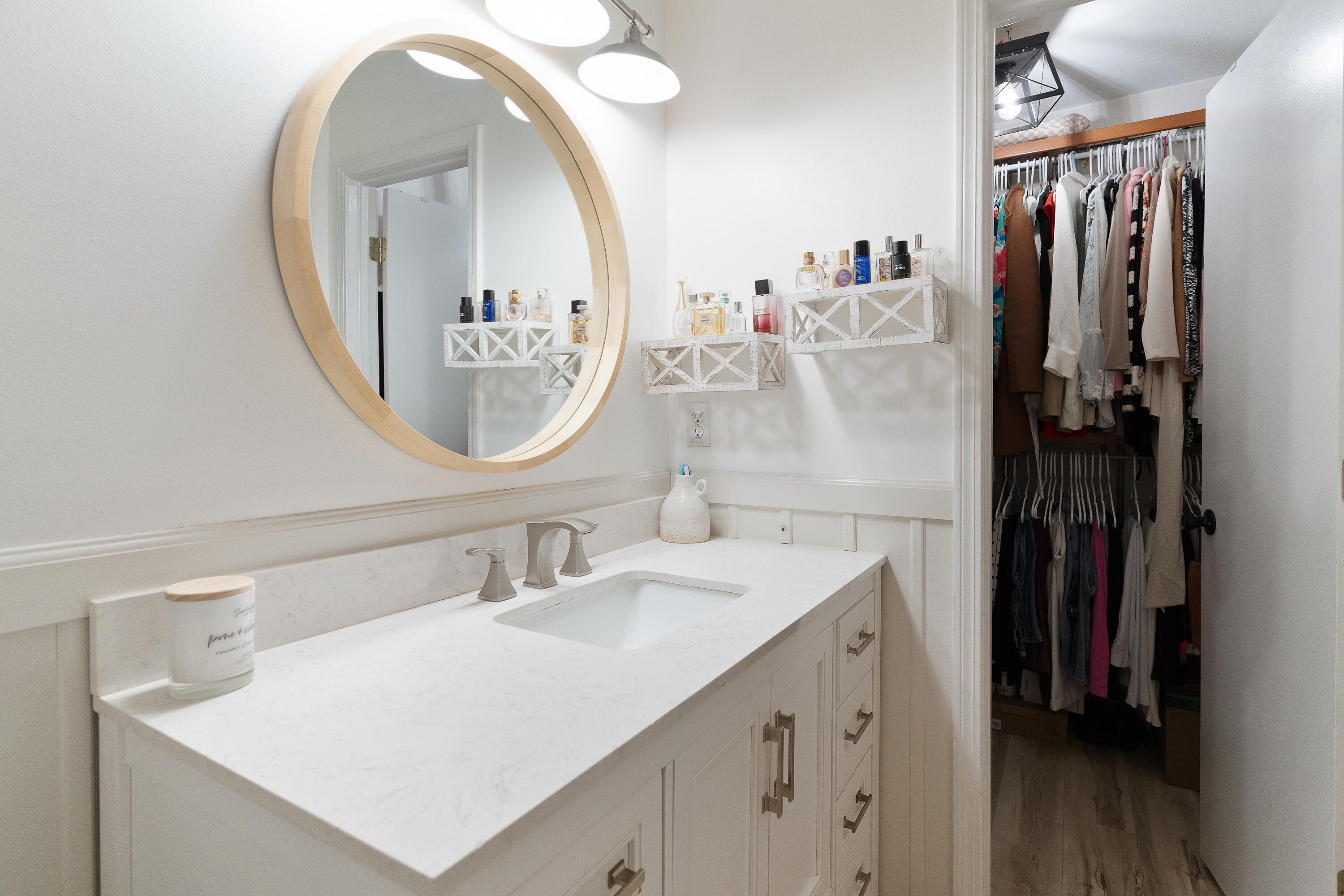 125 Wright Circle Niceville, FL 32578 - Photo 24 of 51 a bathroom with a sink vanity and a mirror