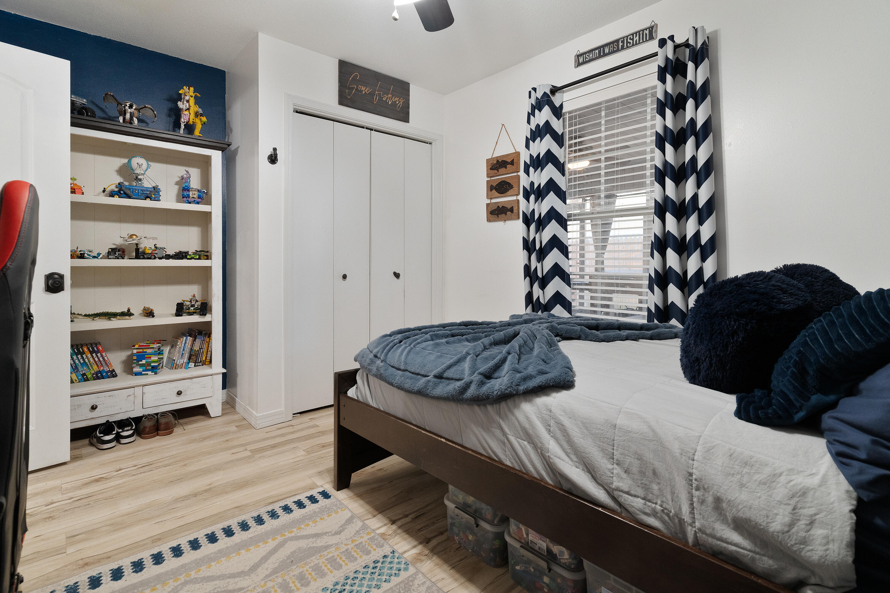 125 Wright Circle Niceville, FL 32578 - Photo 27 of 51 a bedroom with a bed window and closet