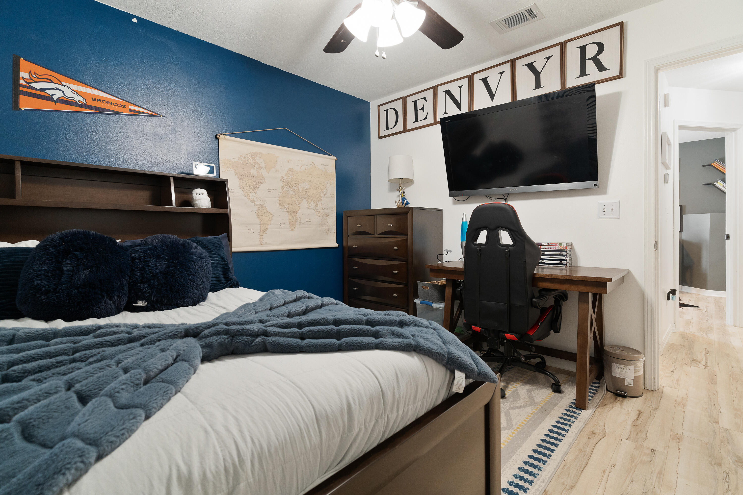 125 Wright Circle Niceville, FL 32578 - Photo 28 of 51 a bedroom with a bed and a flat tv screen on wall