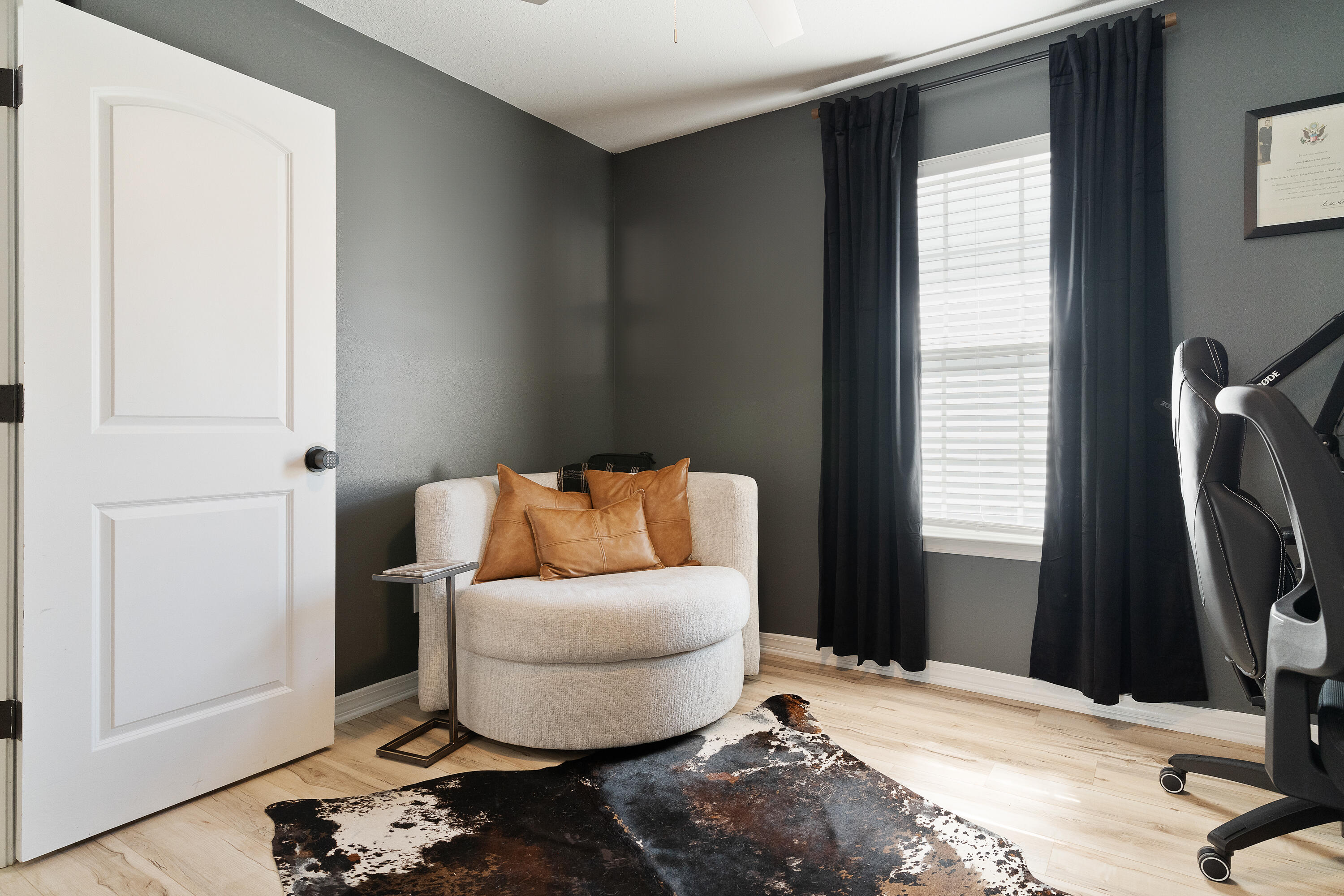 125 Wright Circle Niceville, FL 32578 - Photo 32 of 51 a bedroom with a bed and wooden floor