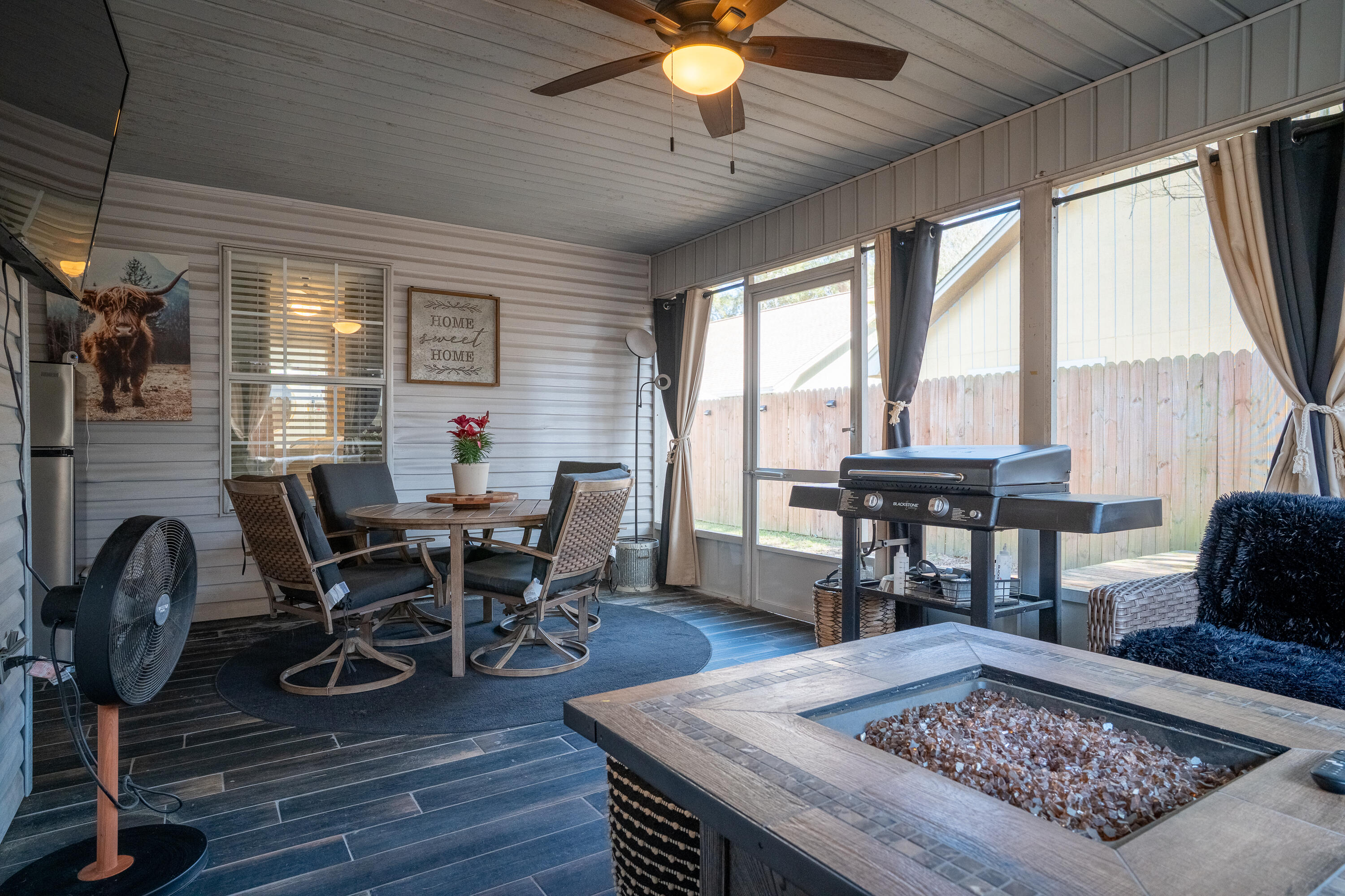 125 Wright Circle Niceville, FL 32578 - Photo 37 of 51 a view of a dining room with furniture and wooden floor