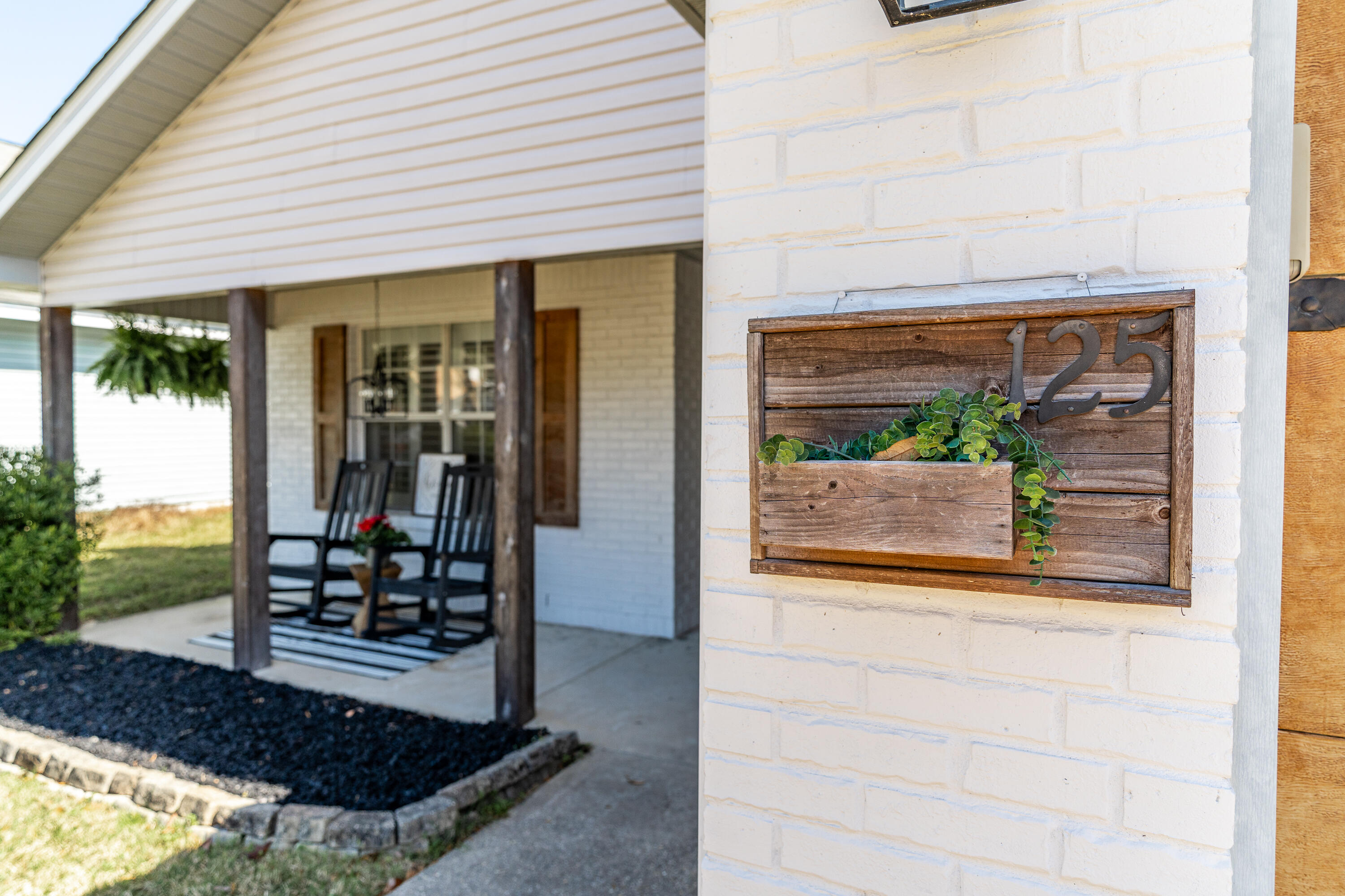 125 Wright Circle Niceville, FL 32578 - Photo 46 of 51 a front view of a house with garden