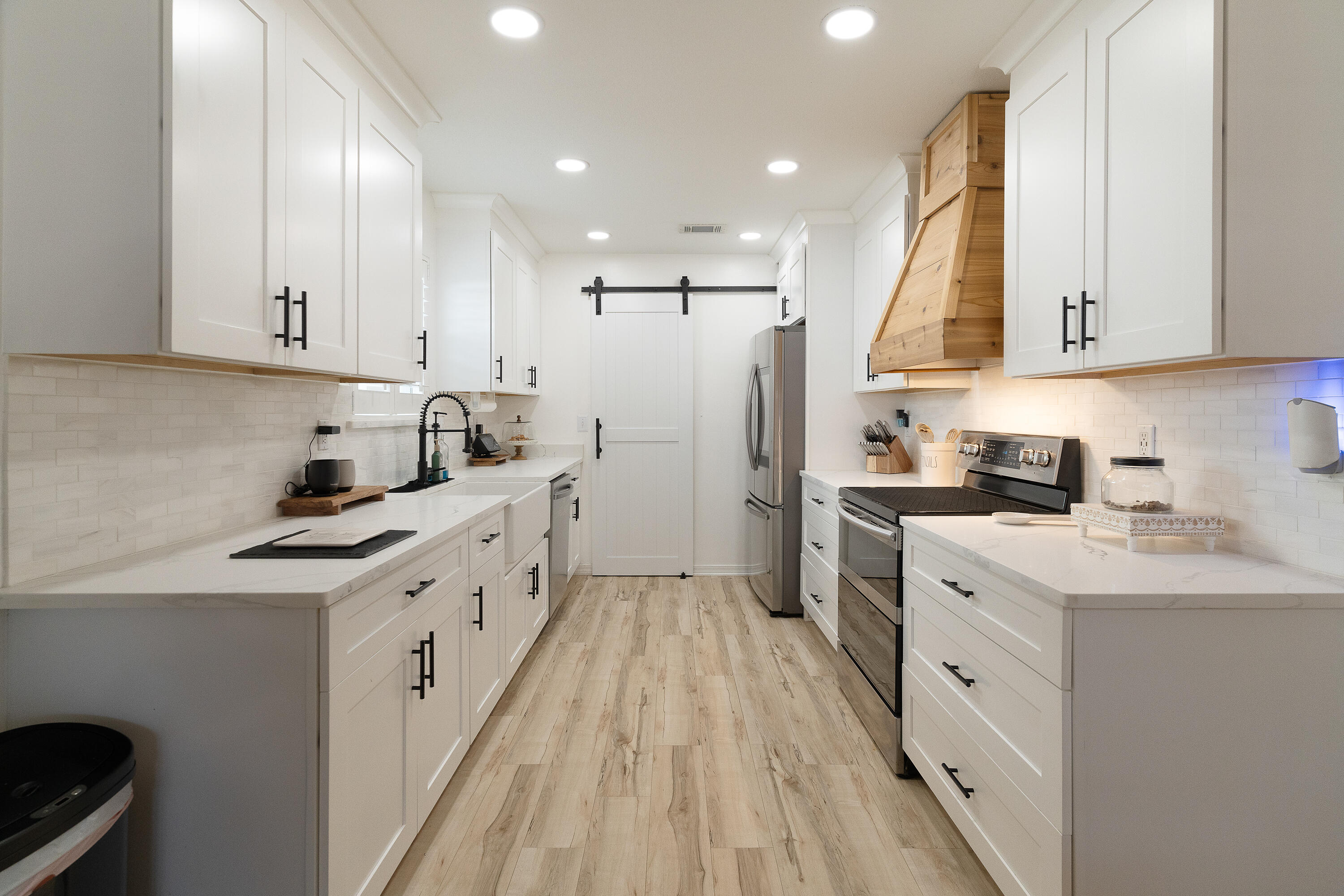 125 Wright Circle Niceville, FL 32578 - Photo 8 of 51 a kitchen with cabinets appliances a sink and a counter top space