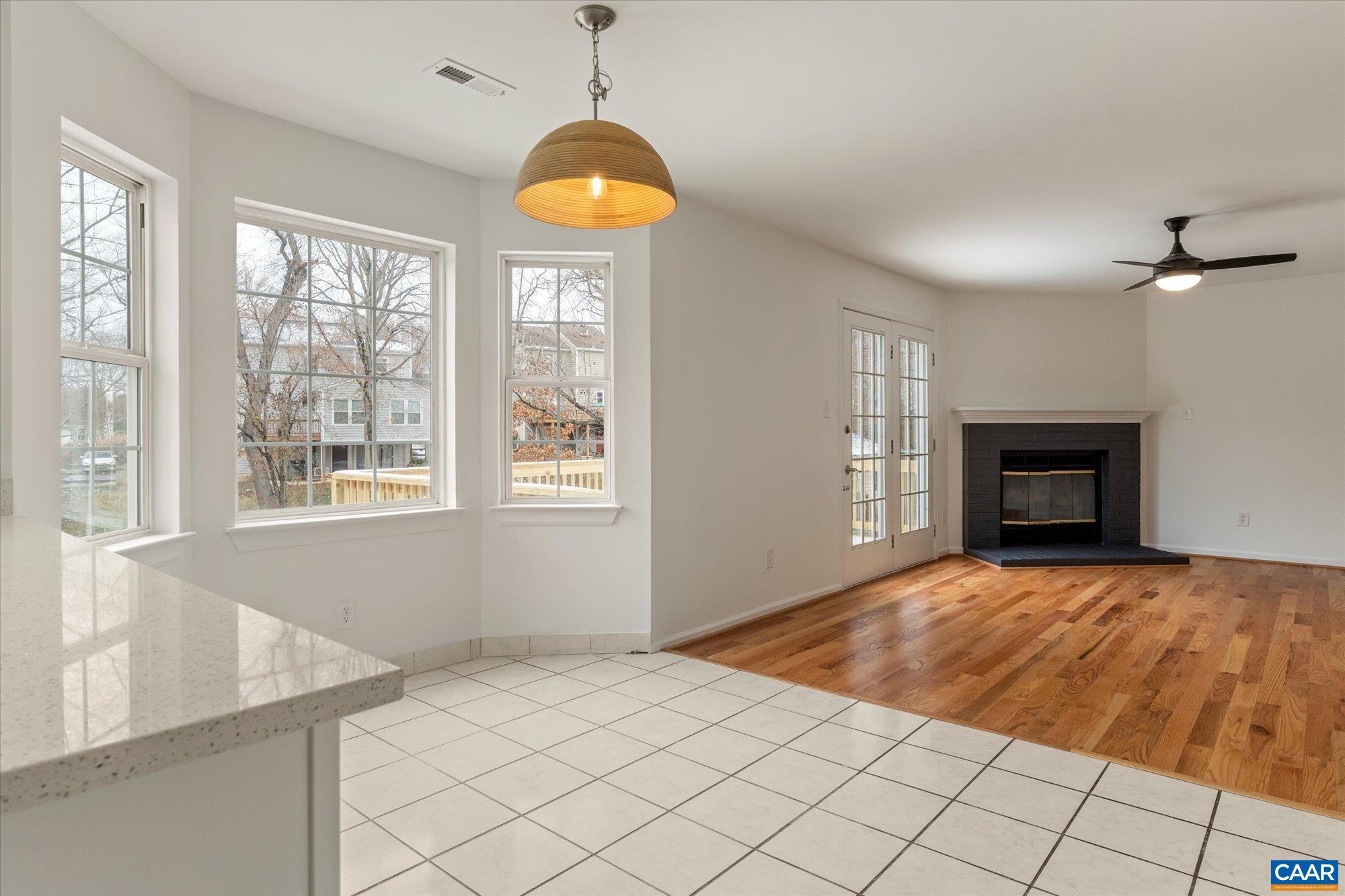 1600 Old Brook Road Charlottesville, VA 22901 - Photo 11 of 48 a view of an empty room with window and chandelier fan