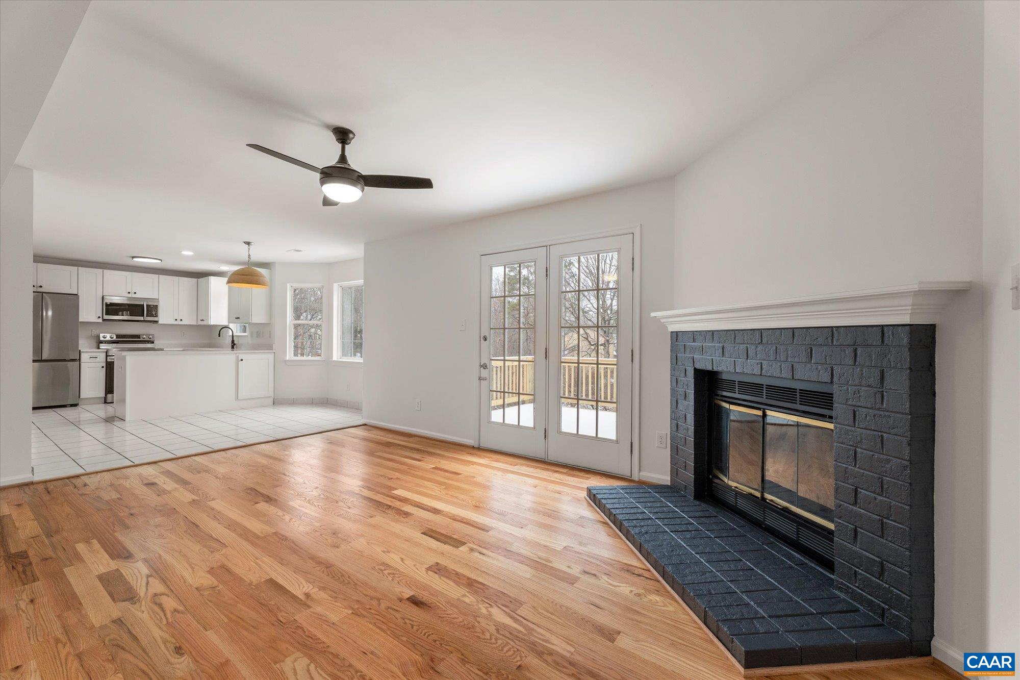 1600 Old Brook Road Charlottesville, VA 22901 - Photo 15 of 48 a view of an empty room with a fireplace and a window